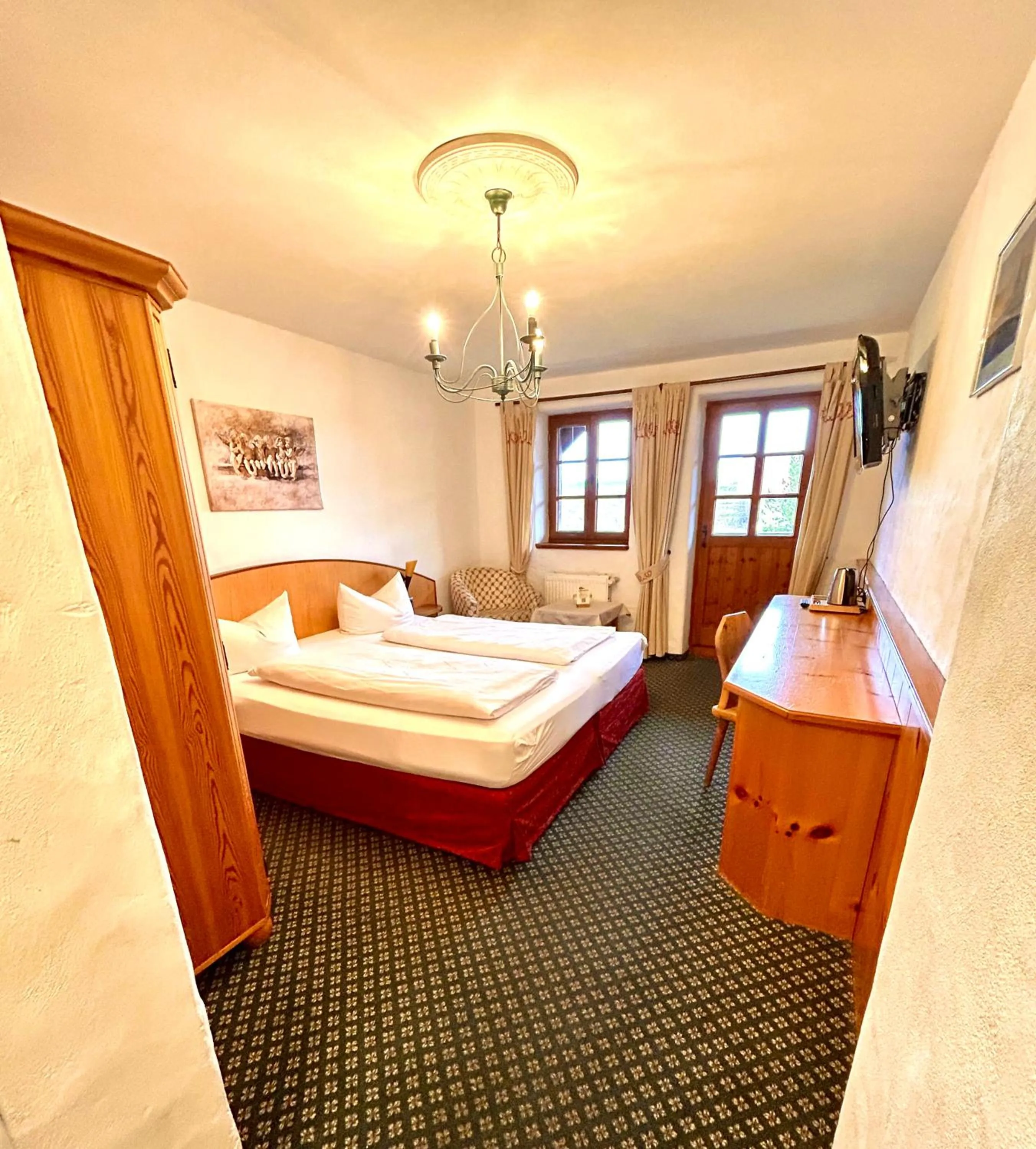 Photo of the whole room, Bed in Landhotel Huberhof