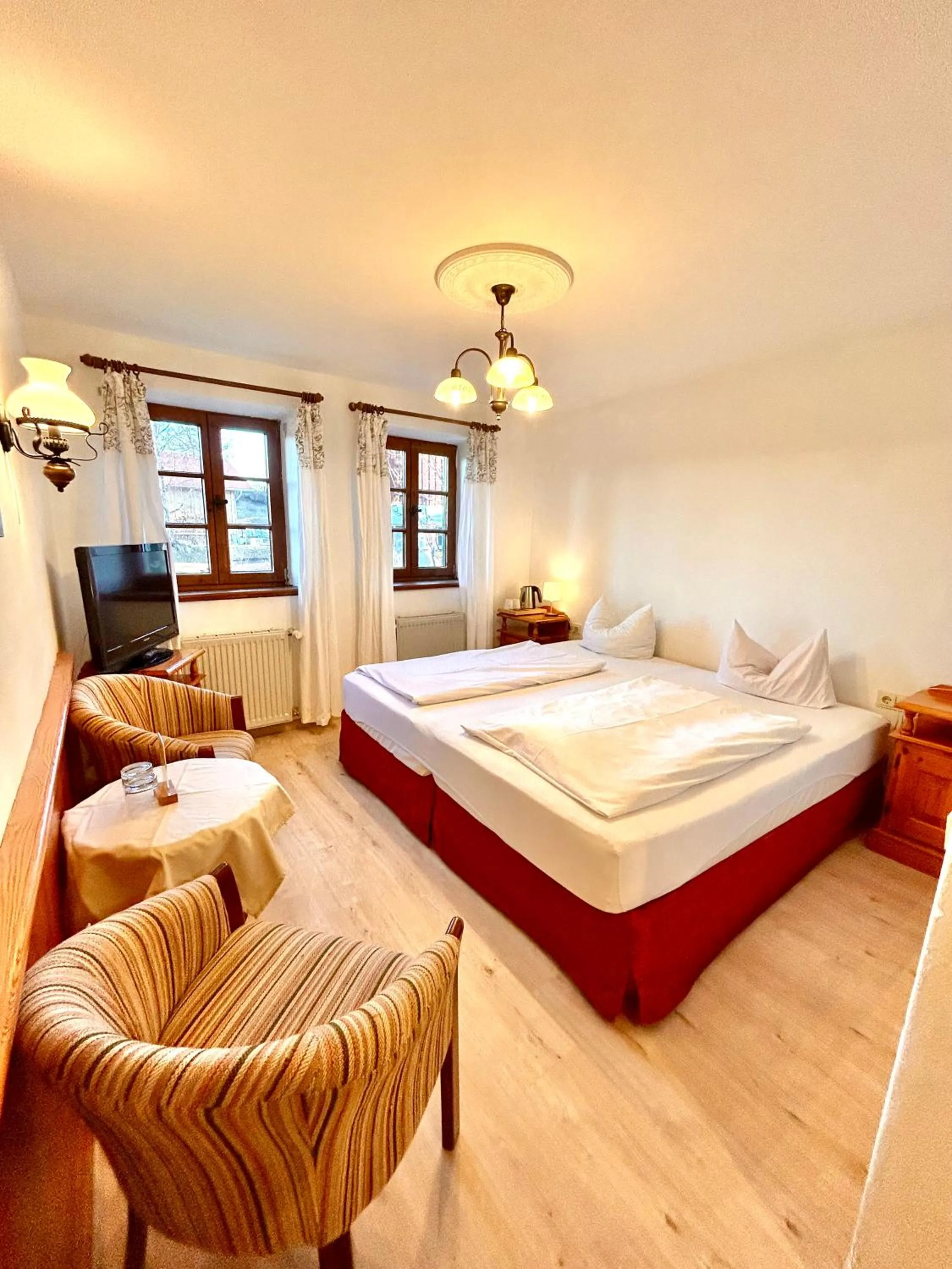 Photo of the whole room, Bed in Landhotel Huberhof