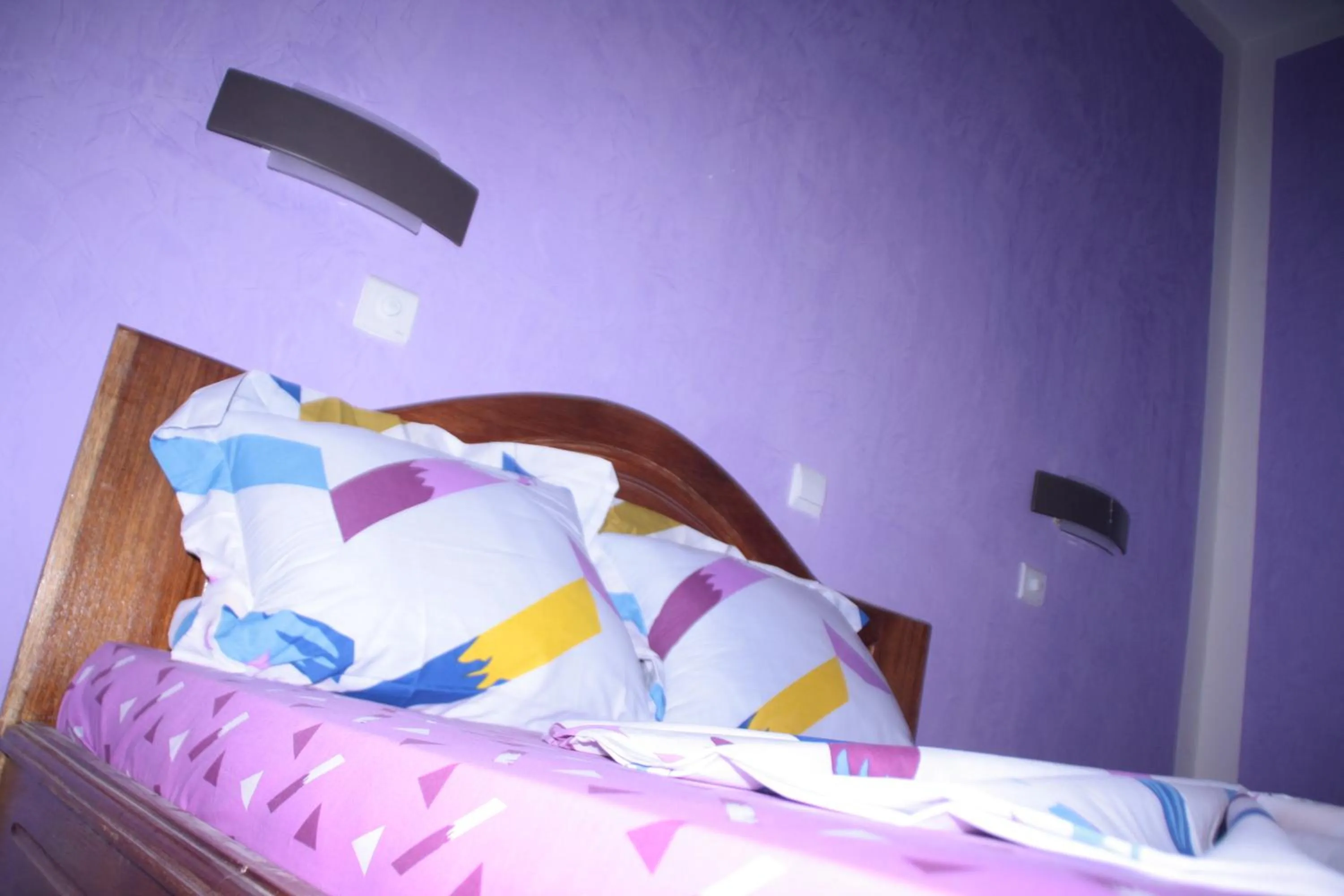 Bed in HOTEL-LE-PARISIEN