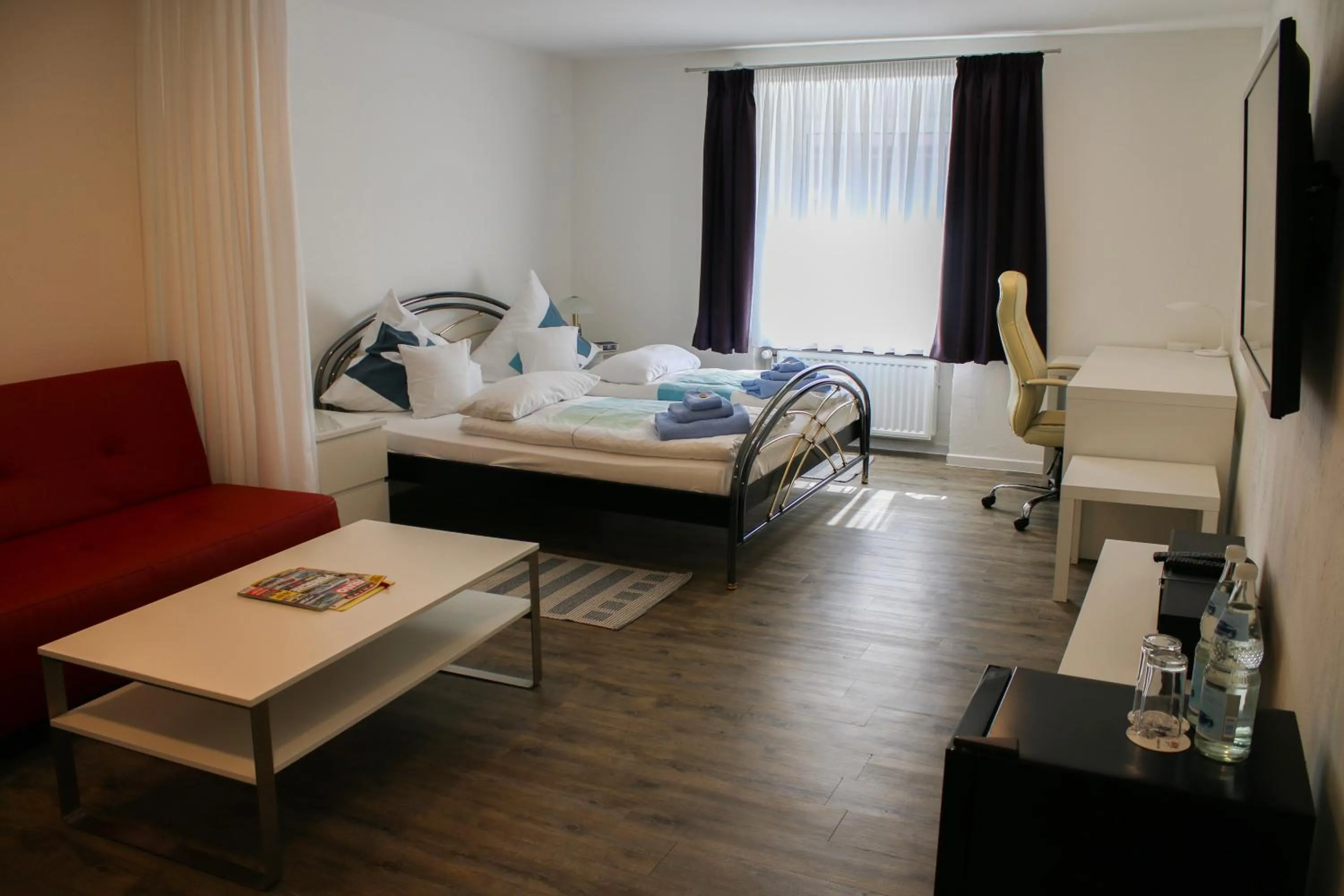 Photo of the whole room, Bed in Landgasthaus Bonn