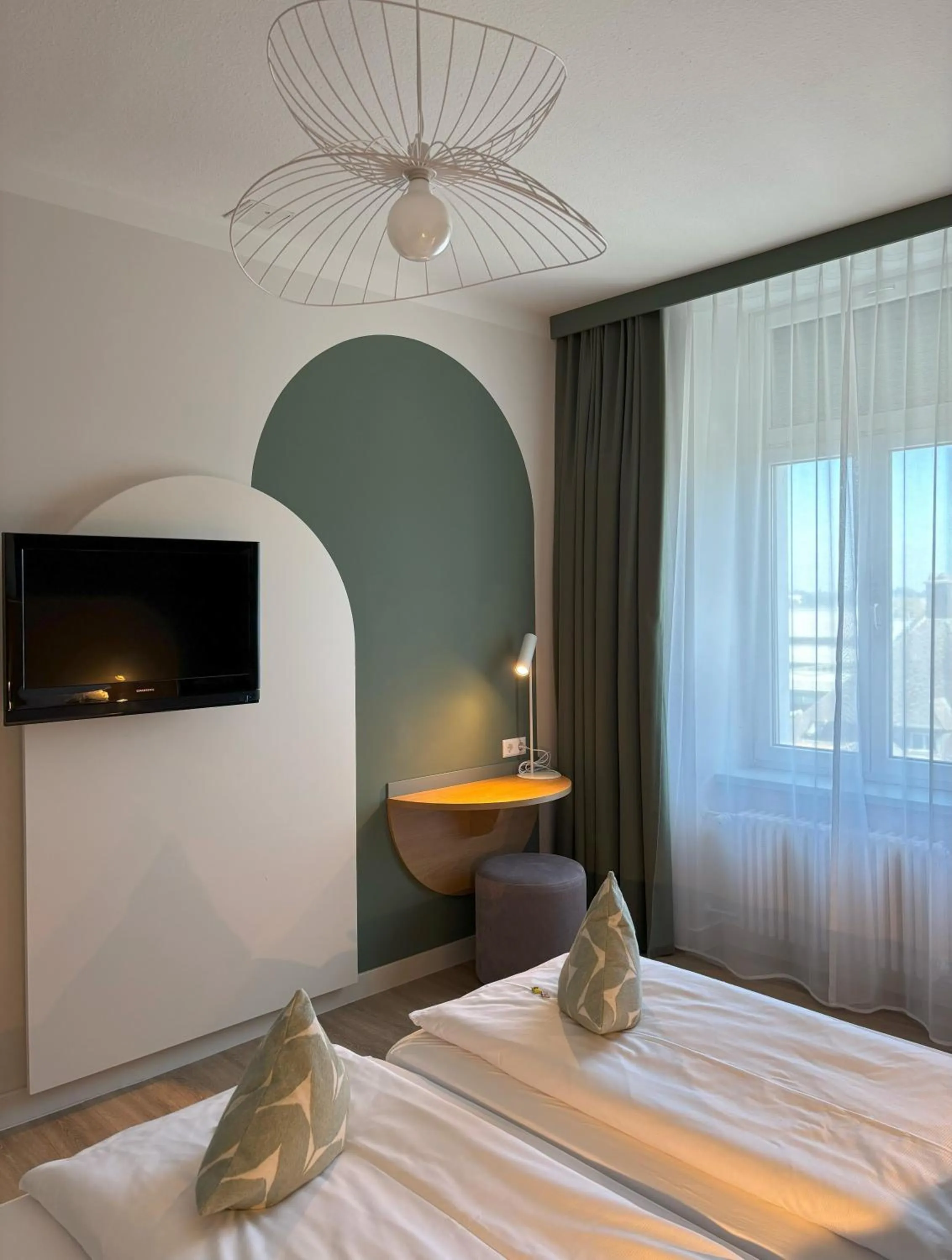 Bed in Gästehaus Centro in Konstanz