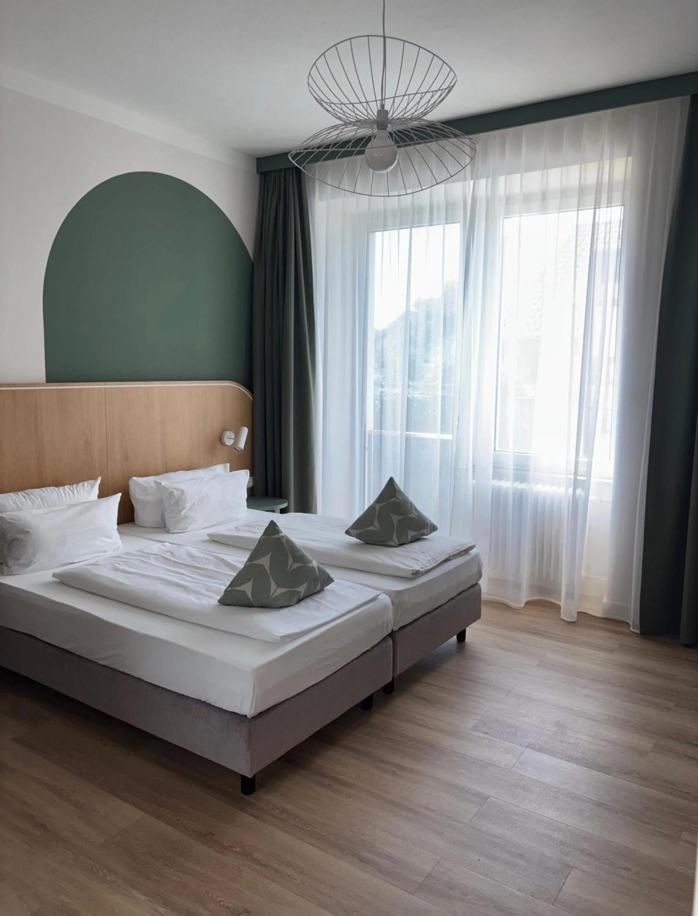 Bed in Gästehaus Centro in Konstanz