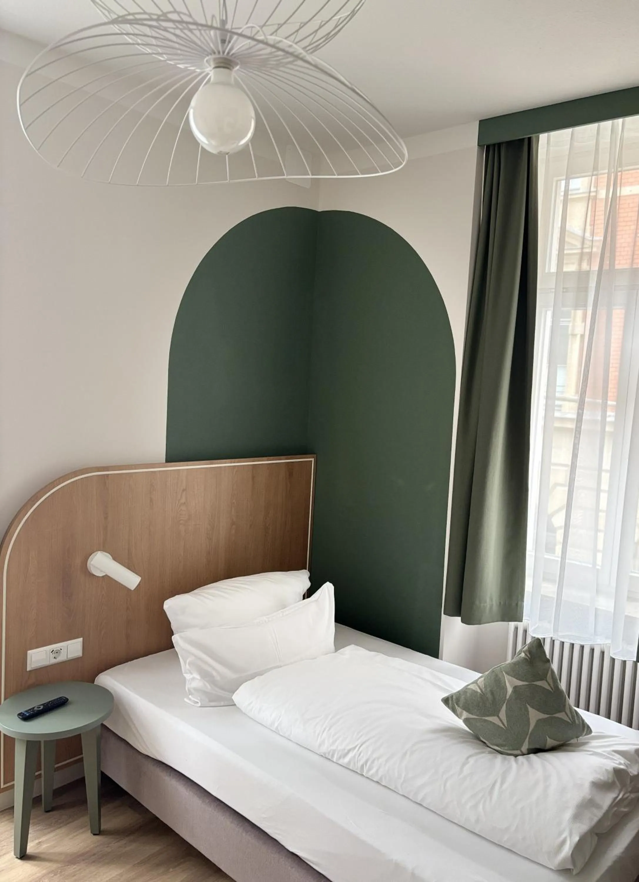 Bed in Gästehaus Centro in Konstanz