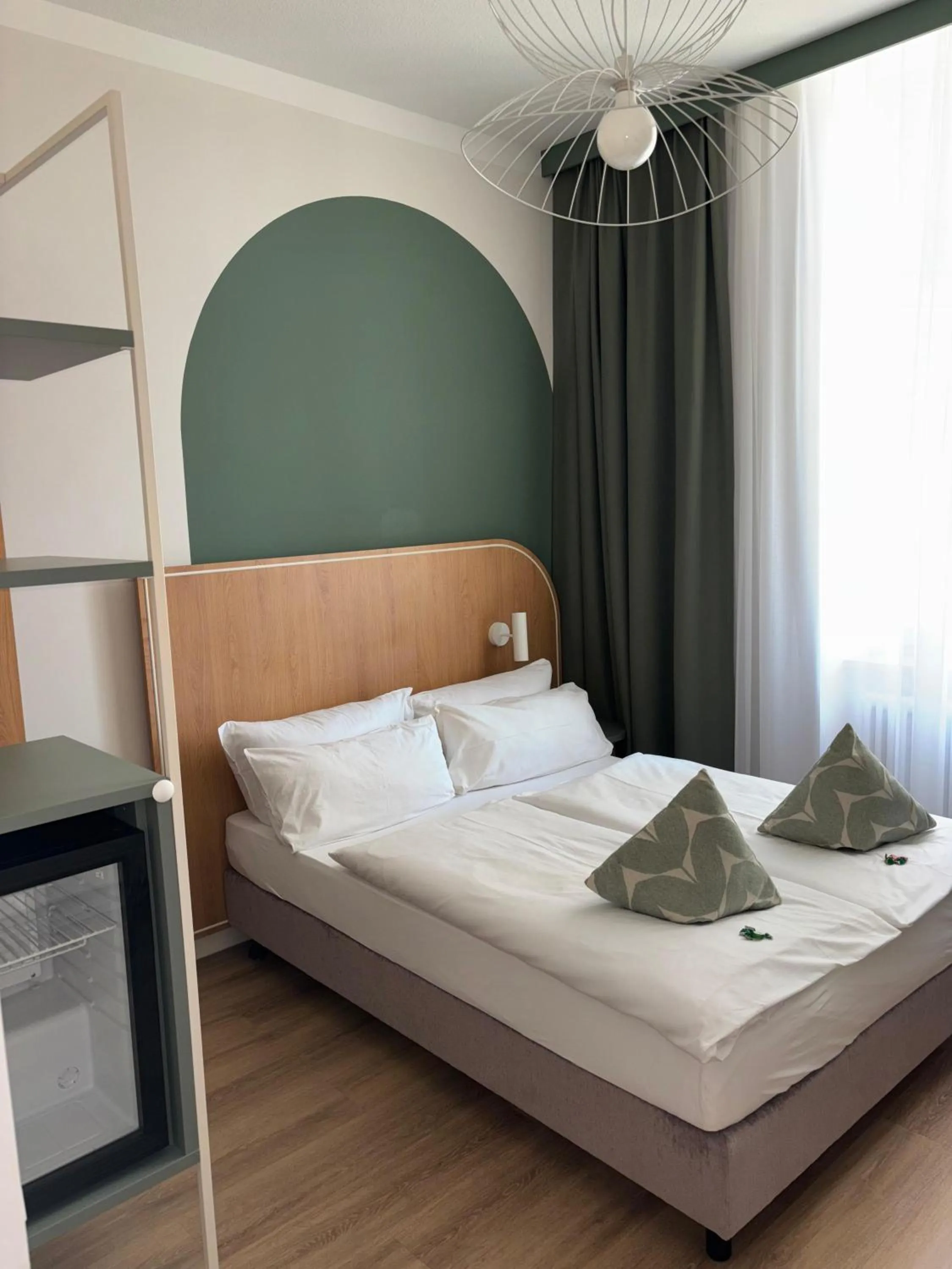 Bed in Gästehaus Centro in Konstanz