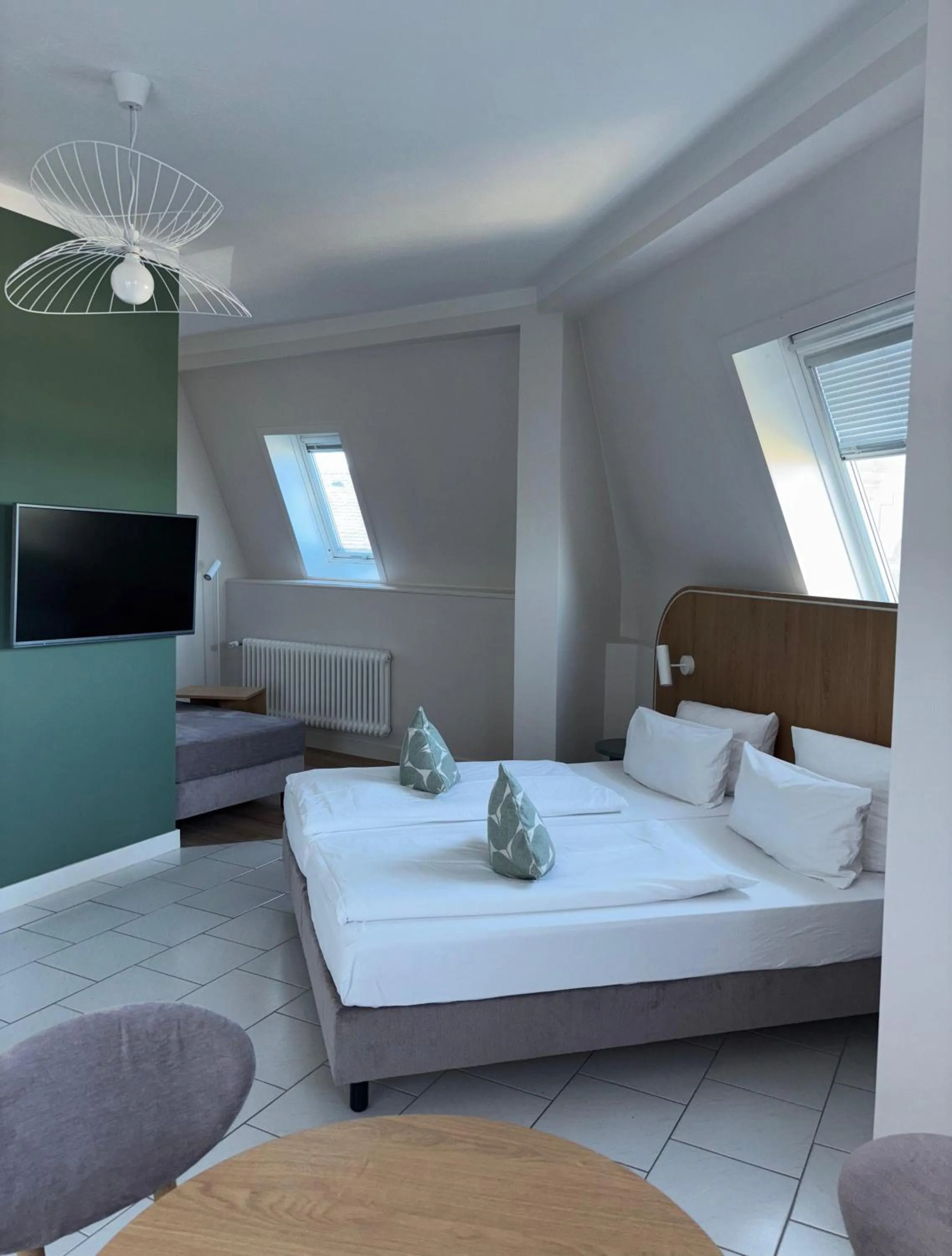 Bed in Gästehaus Centro in Konstanz