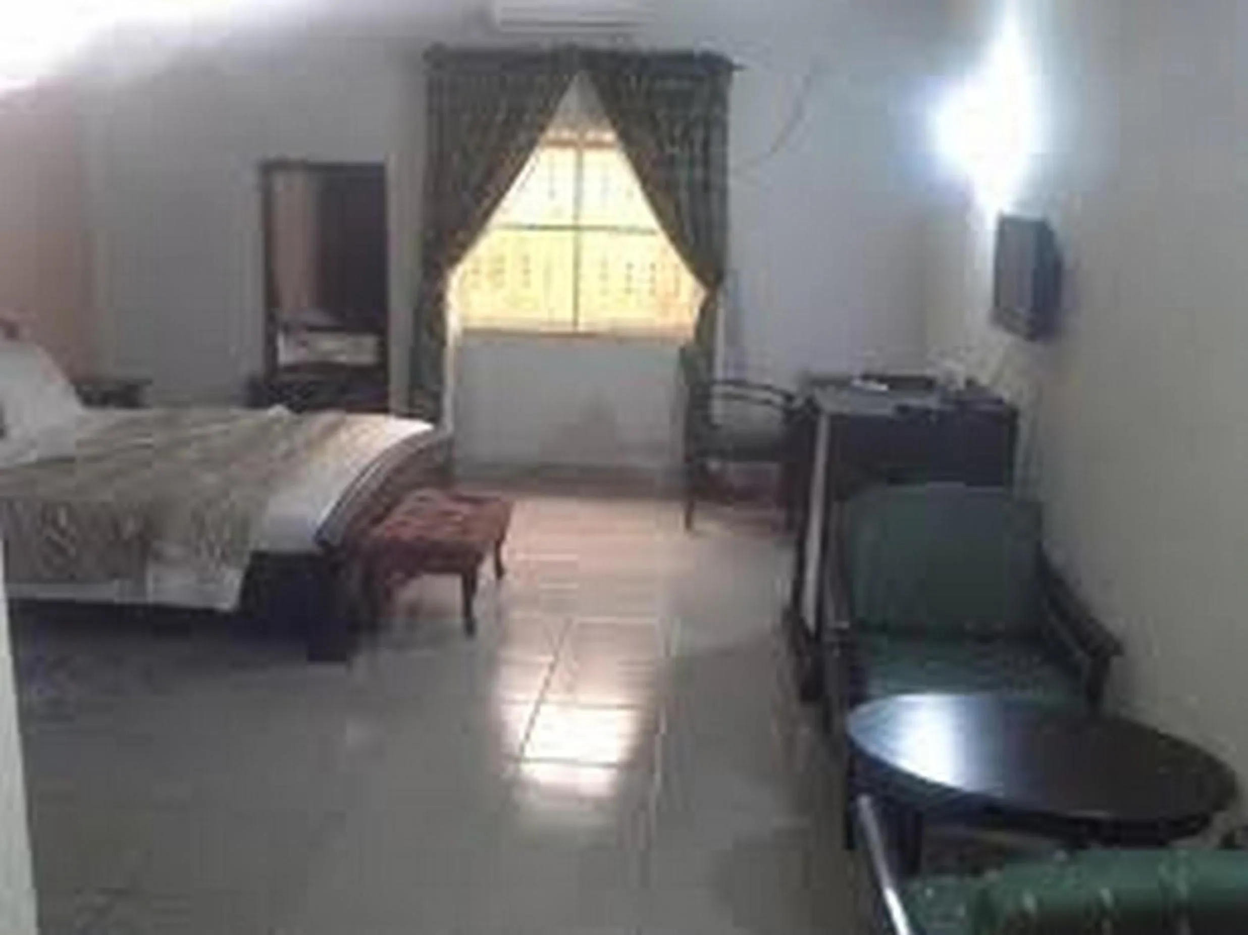 Seating area, Bed in The Golf Prince Hotel