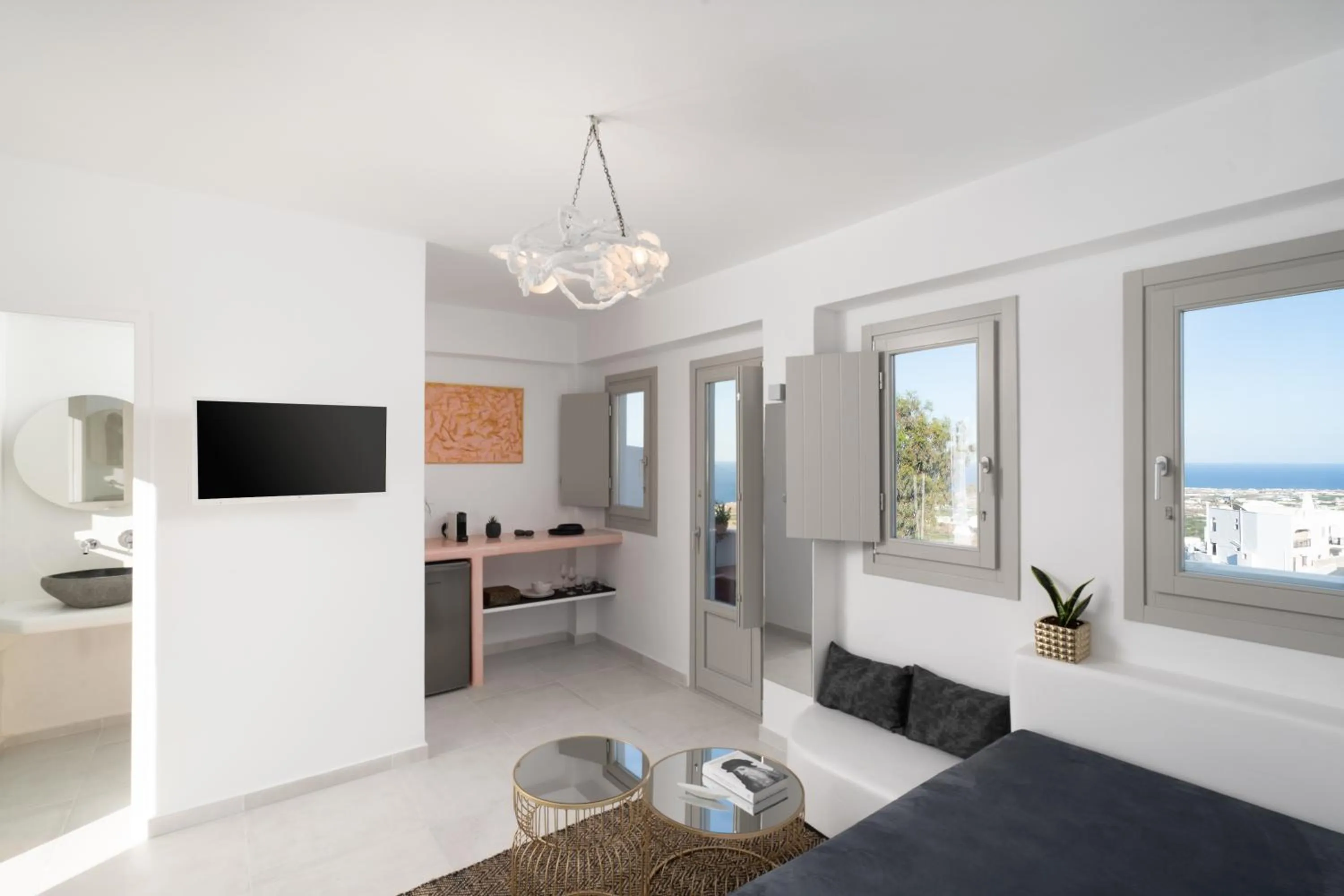 Seating area, Bed in Canyon Santorini