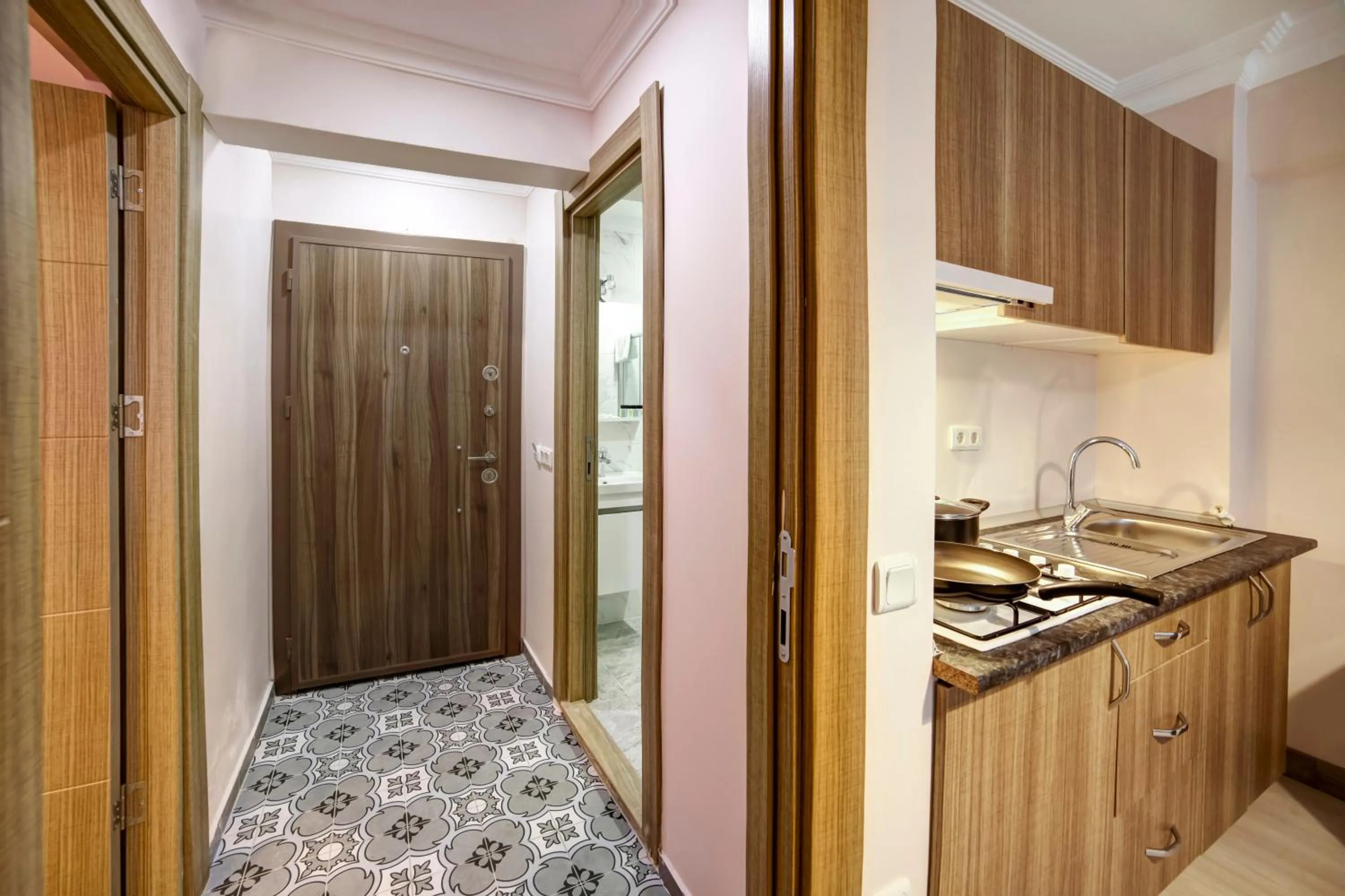 Kitchen or kitchenette in SEVEN ROSES APART HOTEL