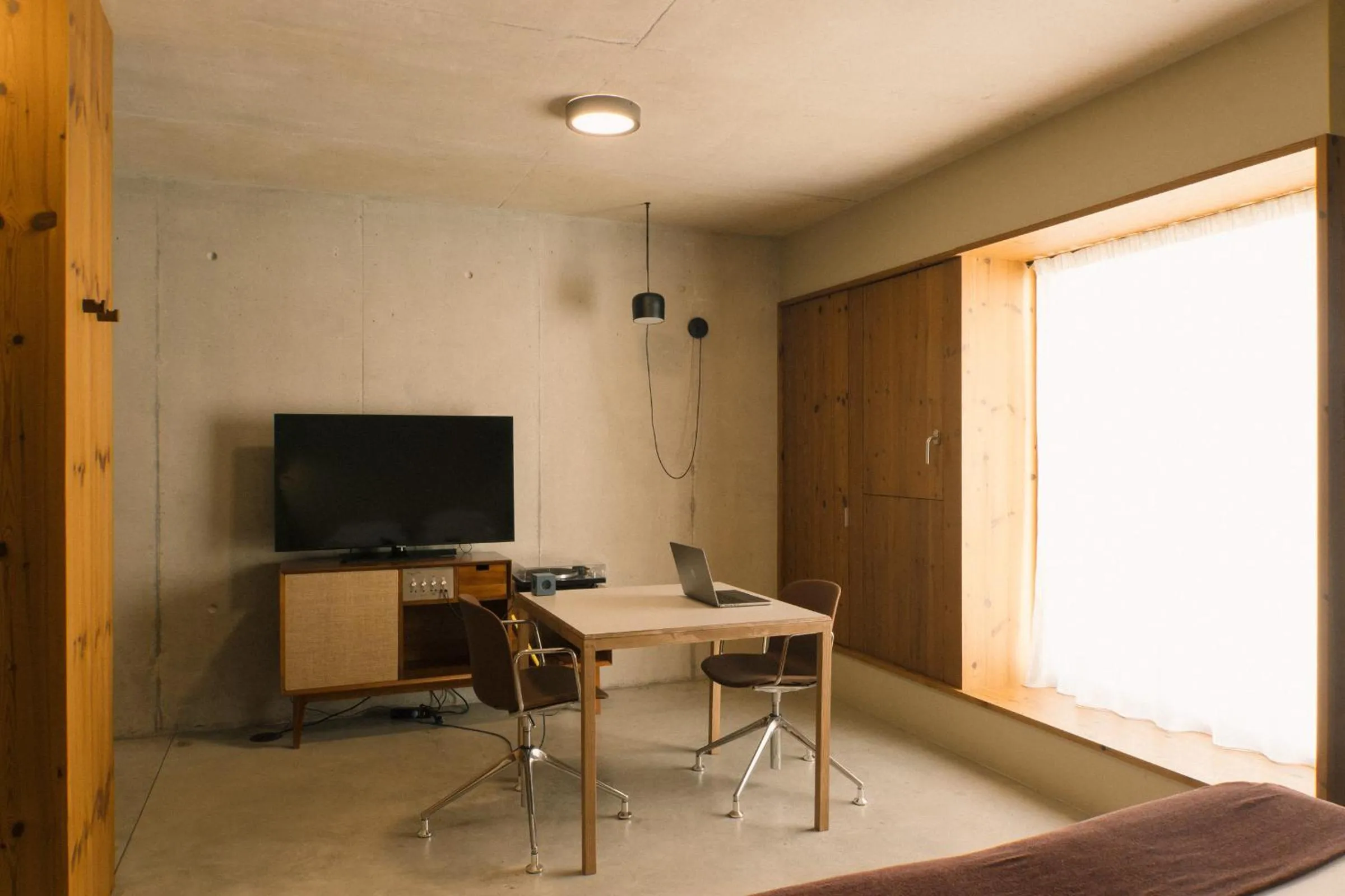 Seating area in Outsite Porto Mouco