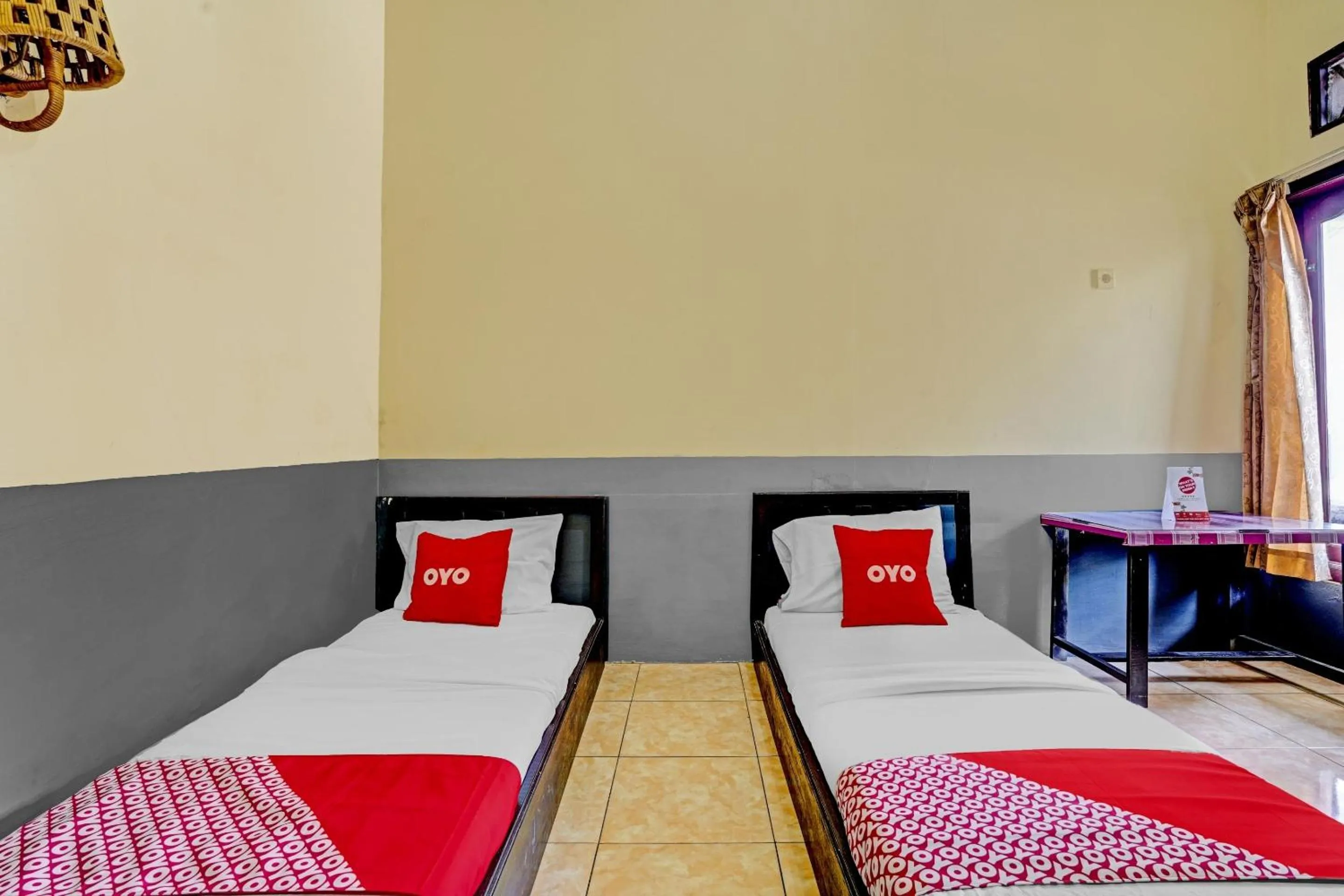 Bedroom in OYO 90405 Penginapan Sasti Kuningan