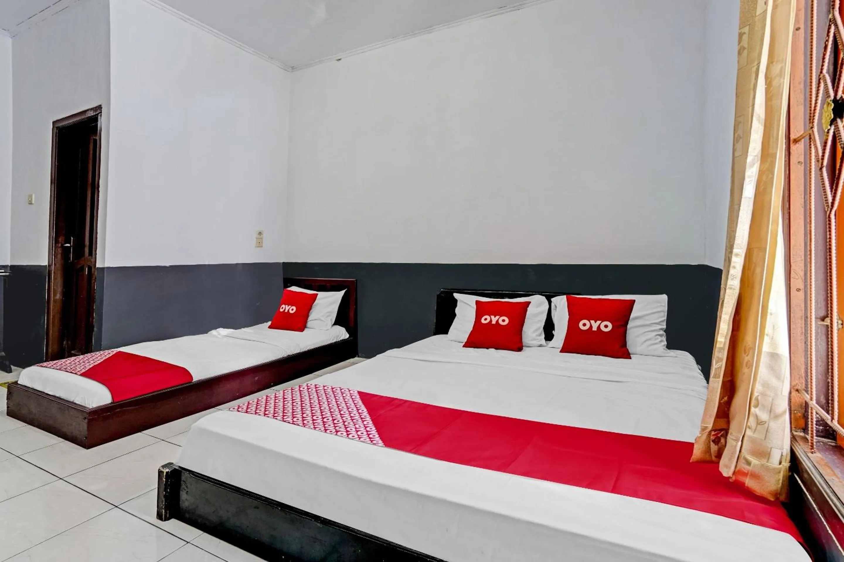 Bedroom in OYO 90405 Penginapan Sasti Kuningan