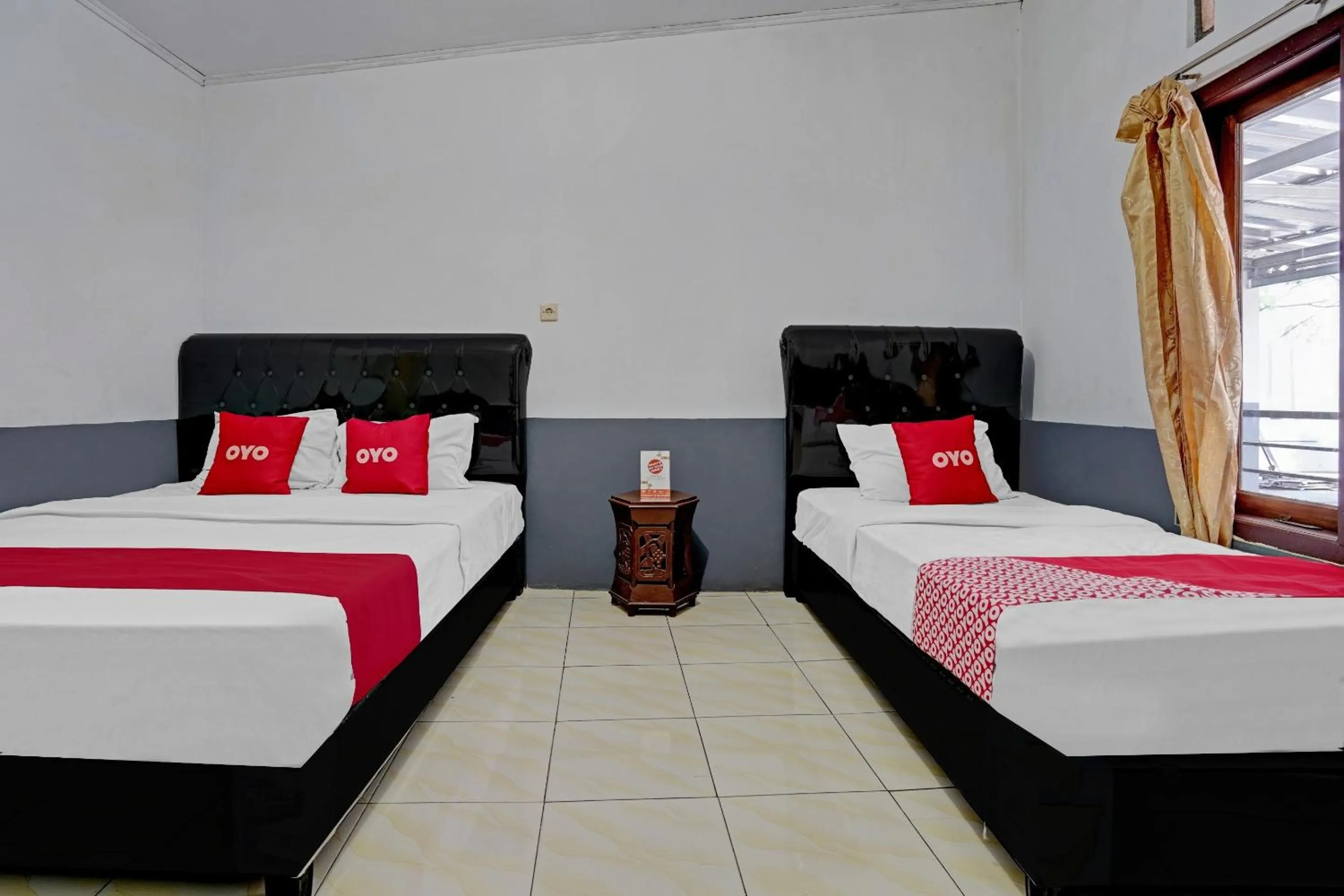 Bedroom in OYO 90405 Penginapan Sasti Kuningan