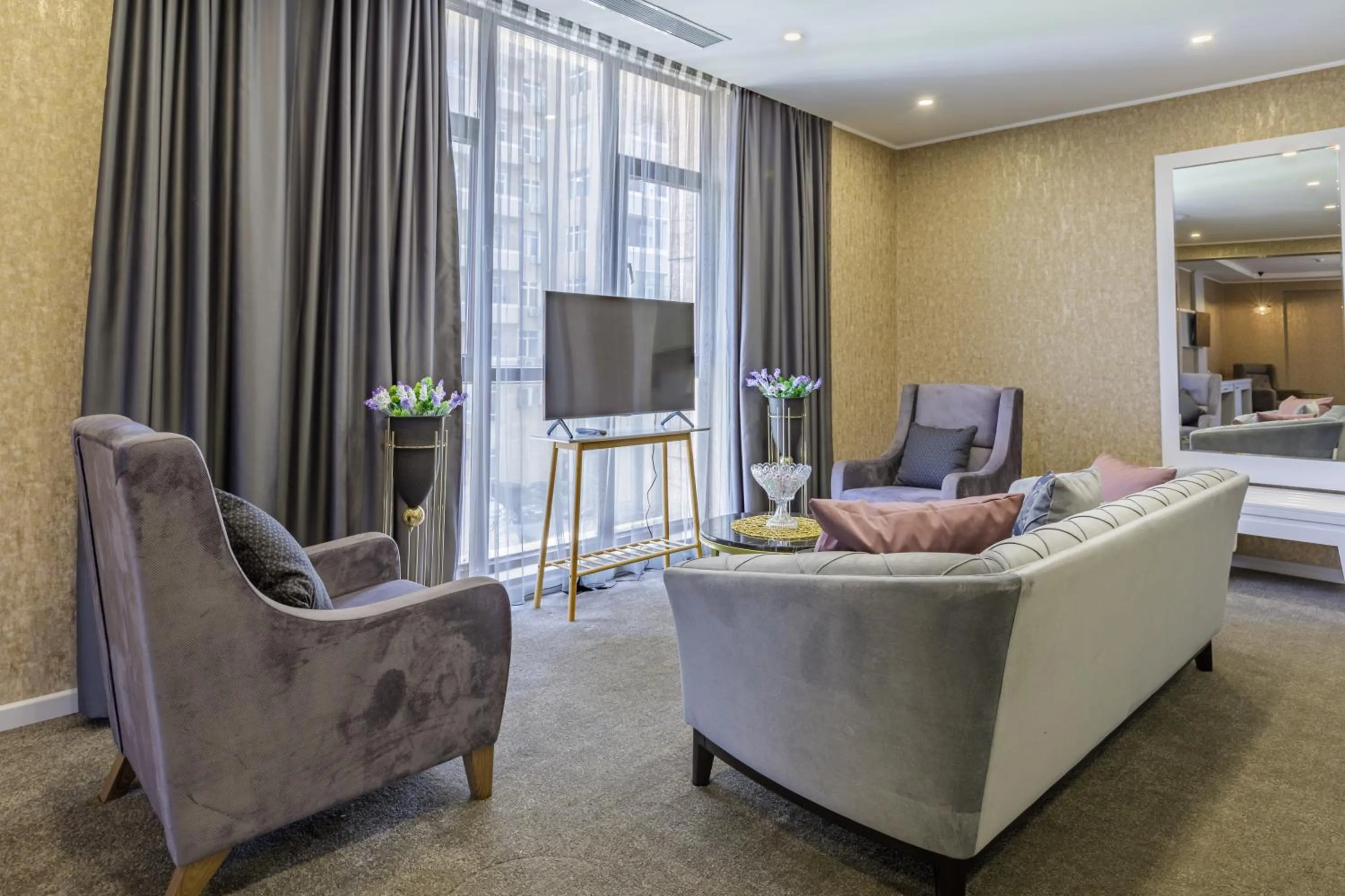 Communal lounge/ TV room in Premium Park Hotel