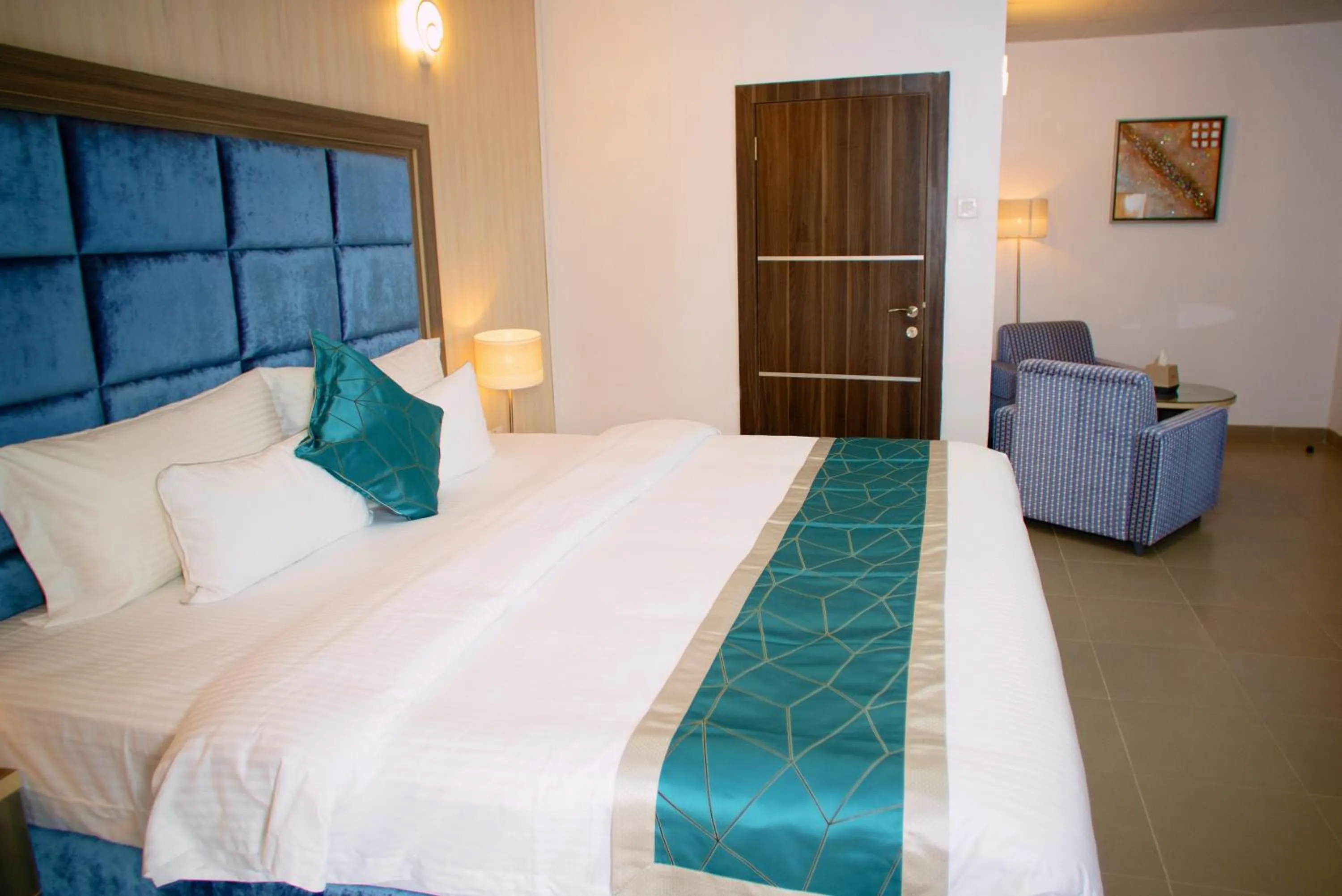 Bed in Riviera Suites