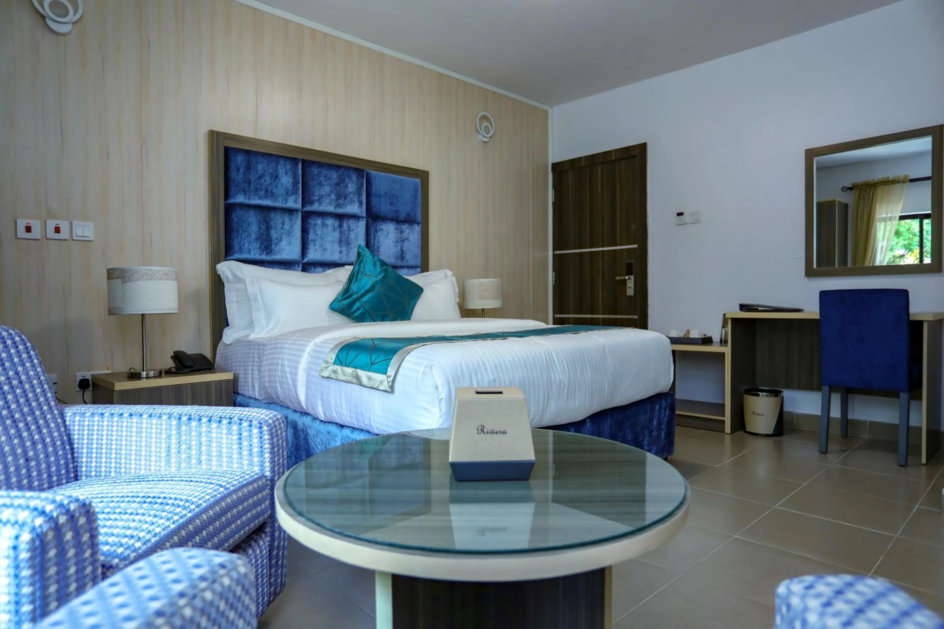 Bed in Riviera Suites