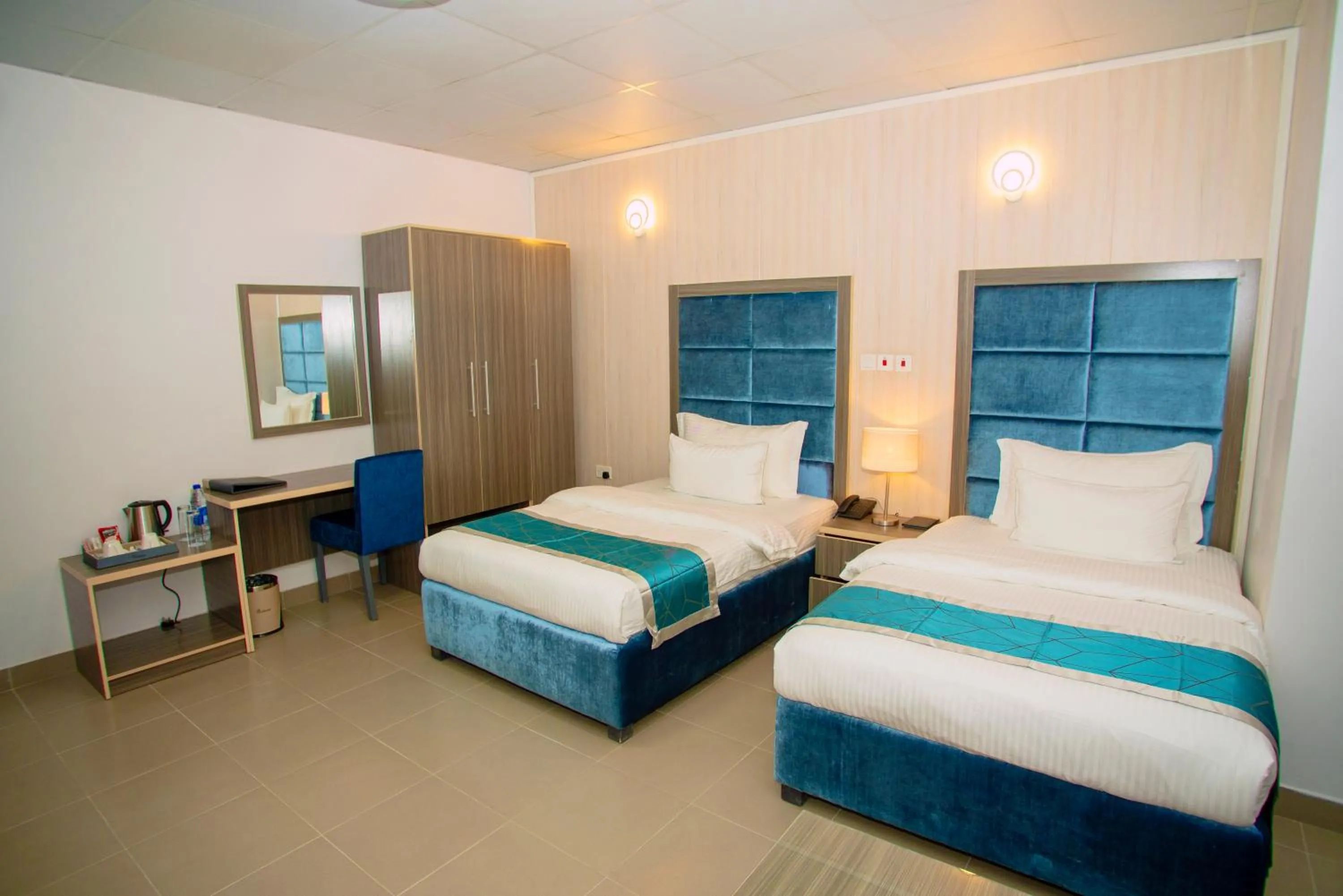 Bed in Riviera Suites