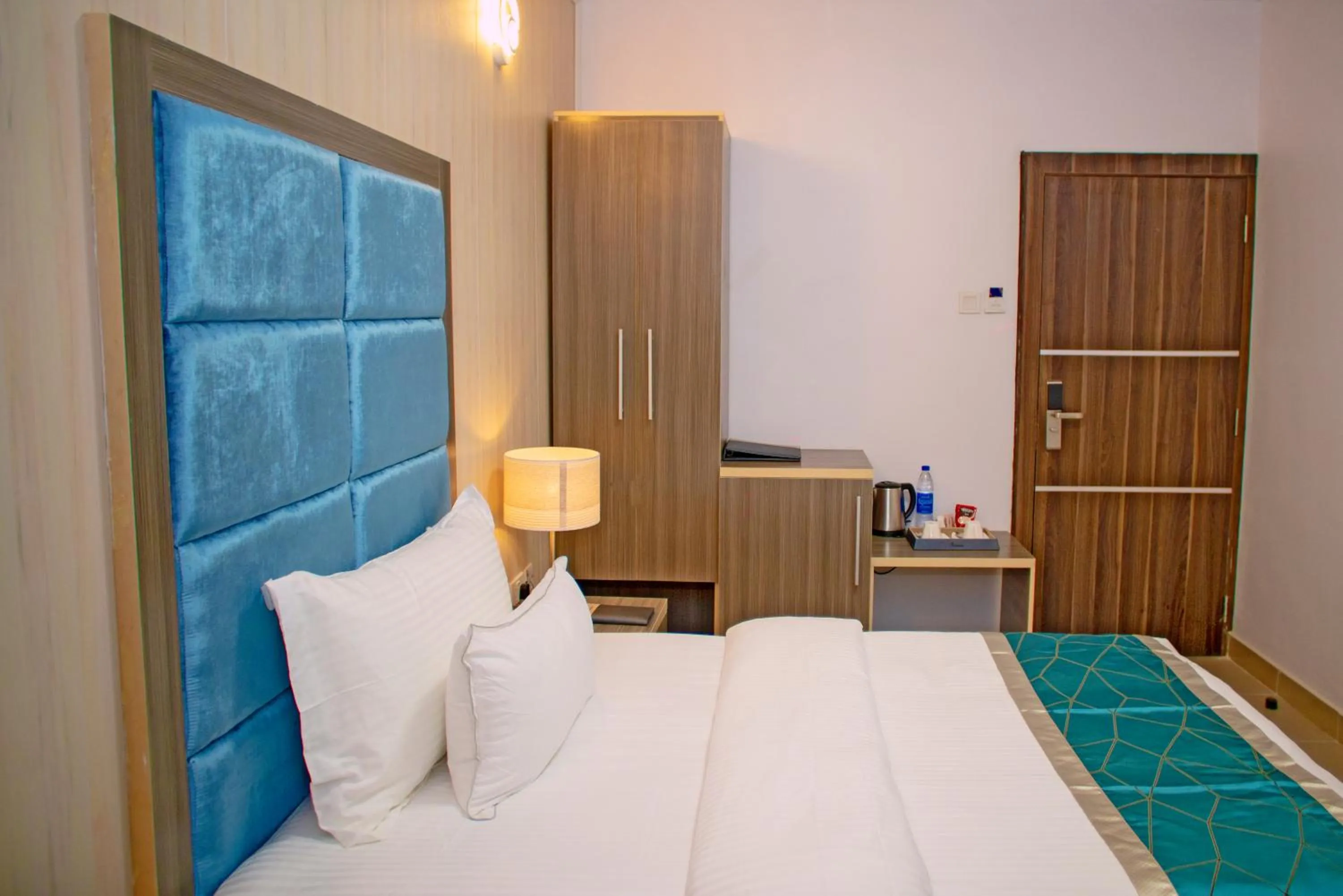 Bed in Riviera Suites