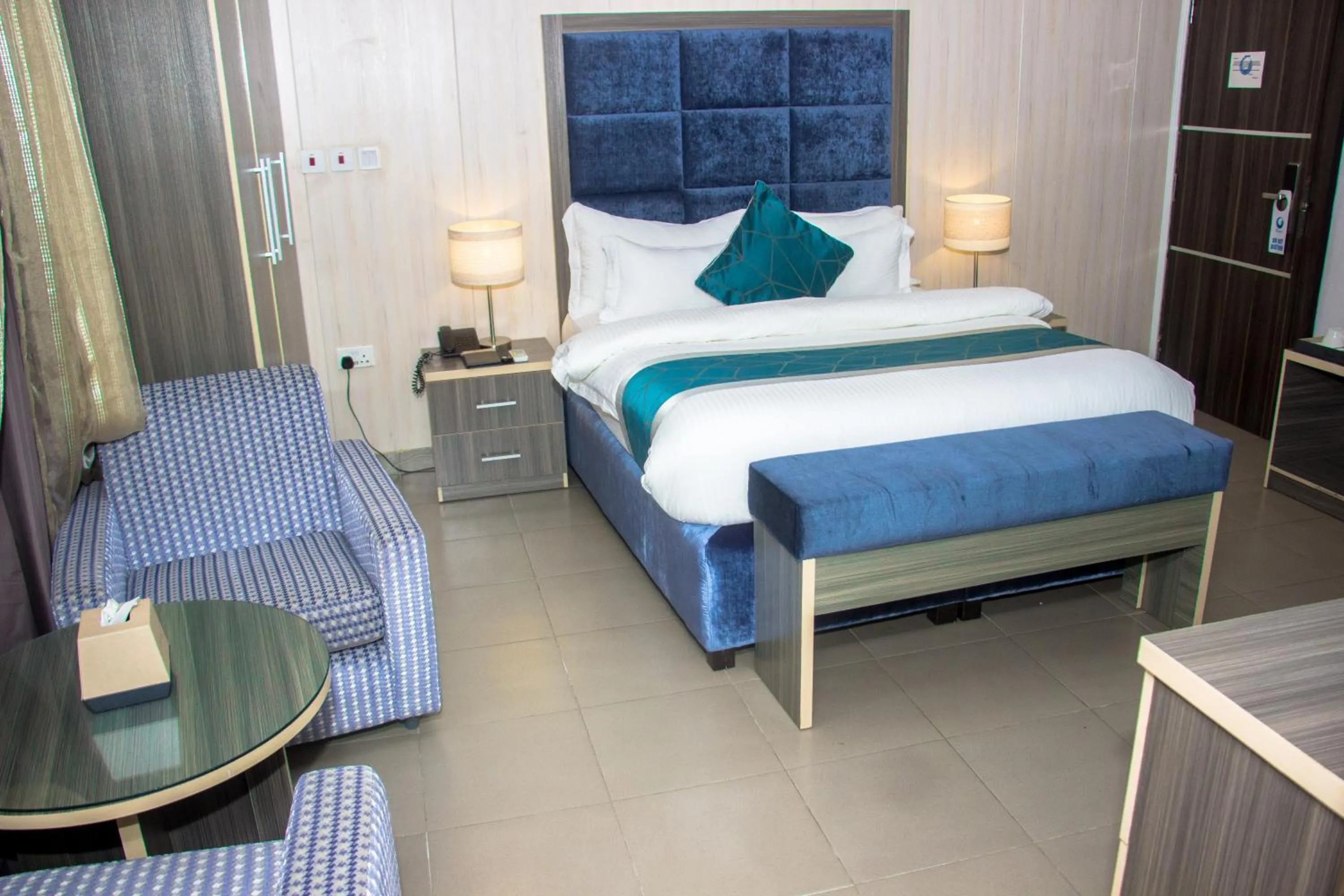 Bed in Riviera Suites