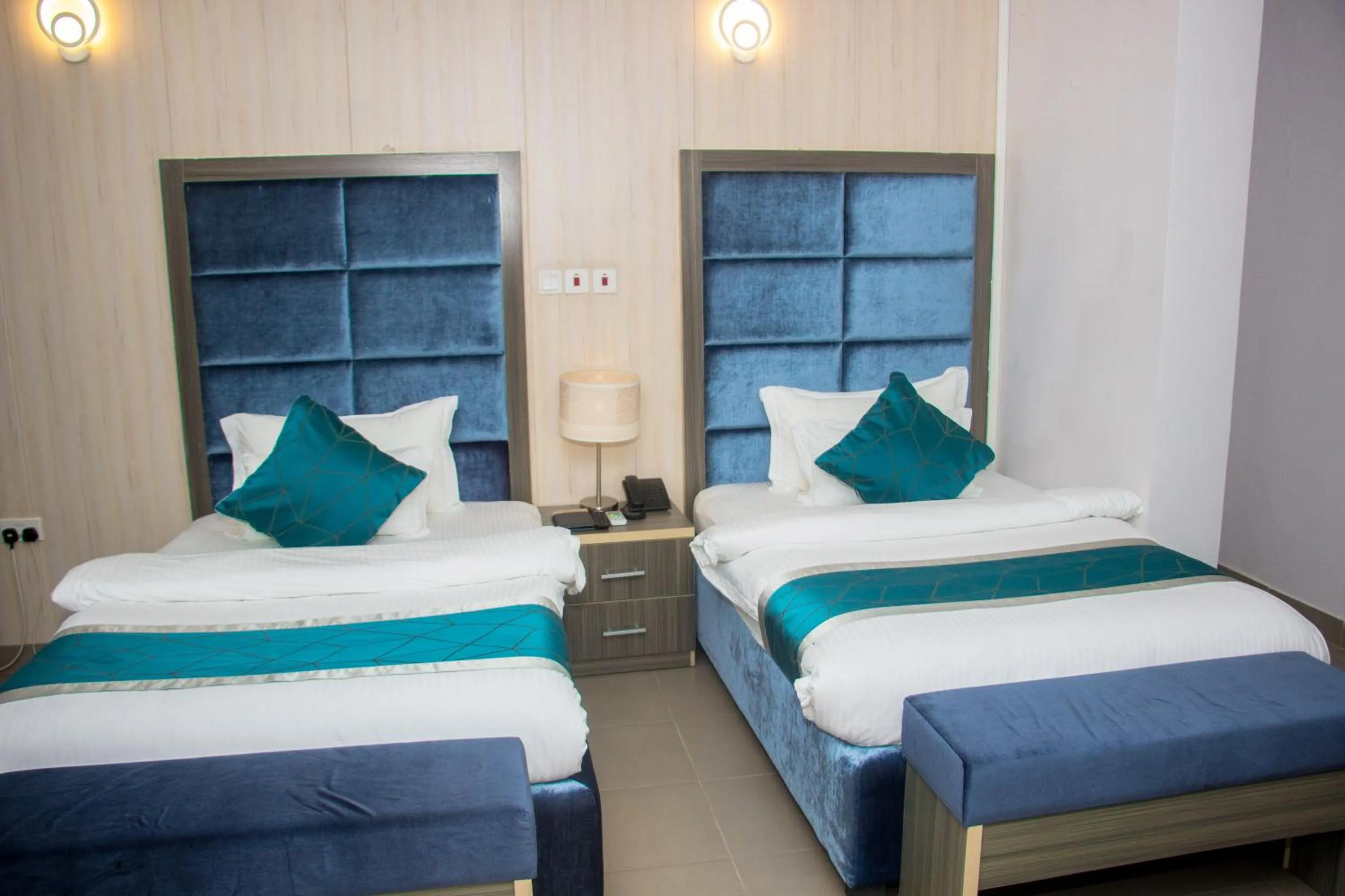 Bed in Riviera Suites