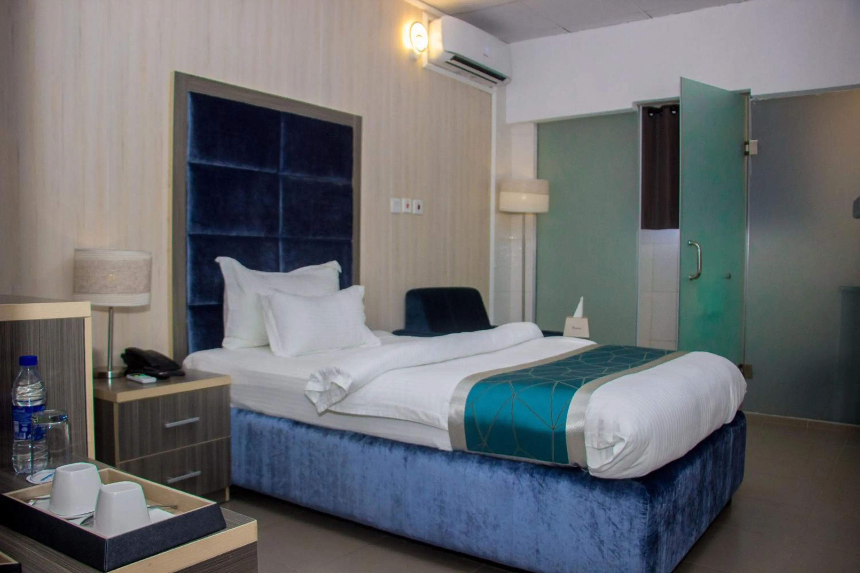 Bed in Riviera Suites