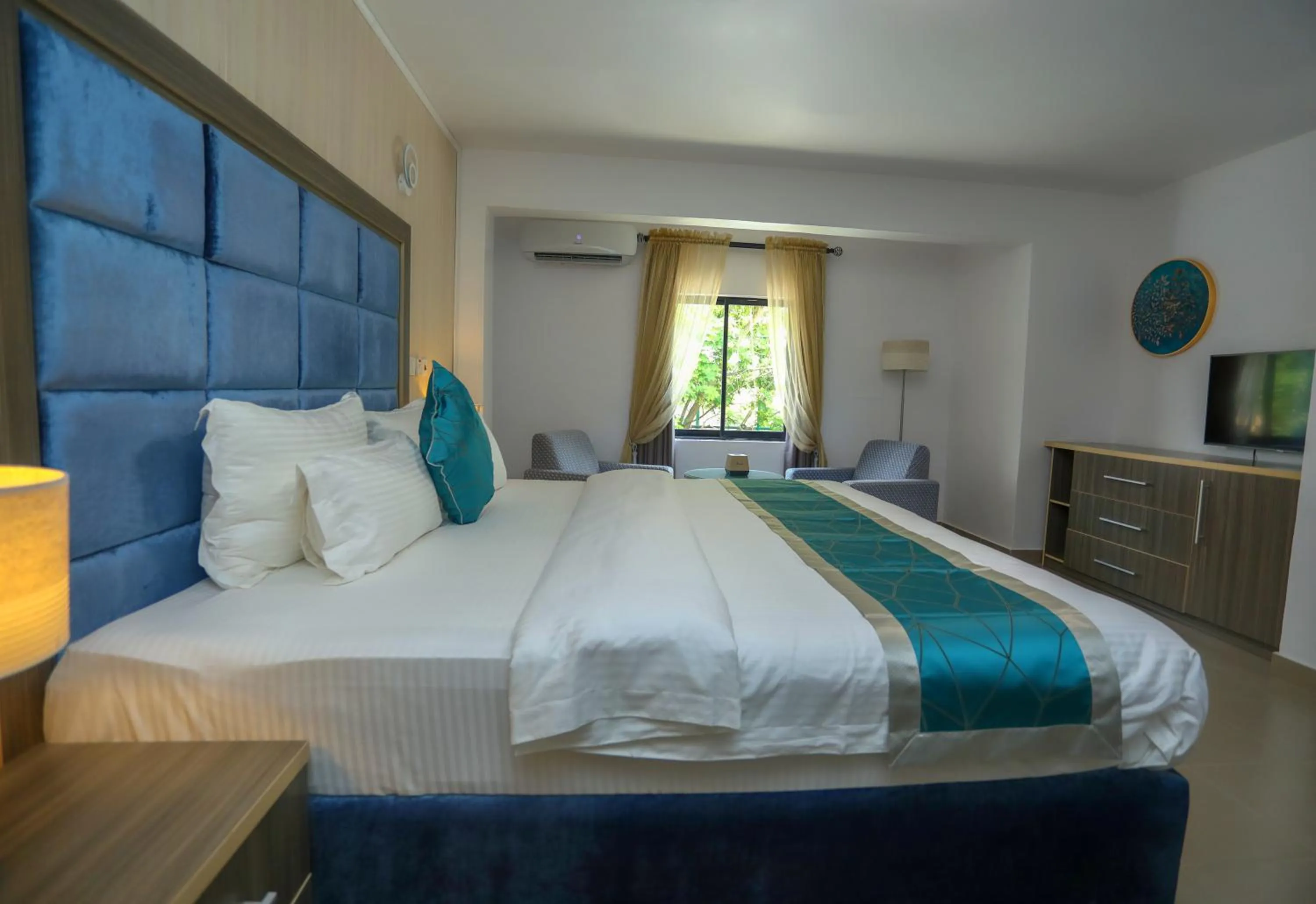 Bed in Riviera Suites