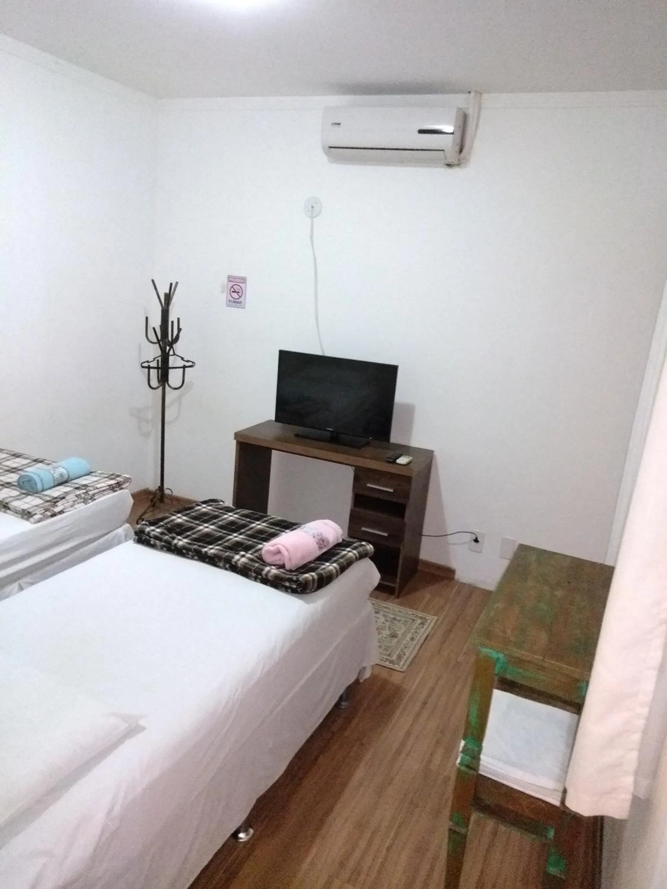 Bed in Ipê Rosa Hotel