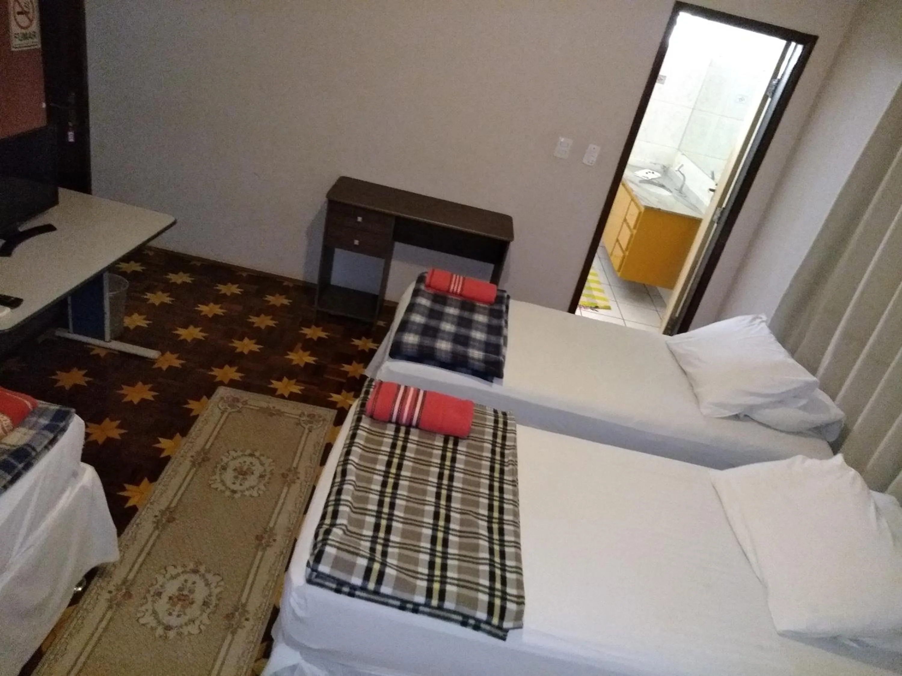 Bed in Ipê Rosa Hotel
