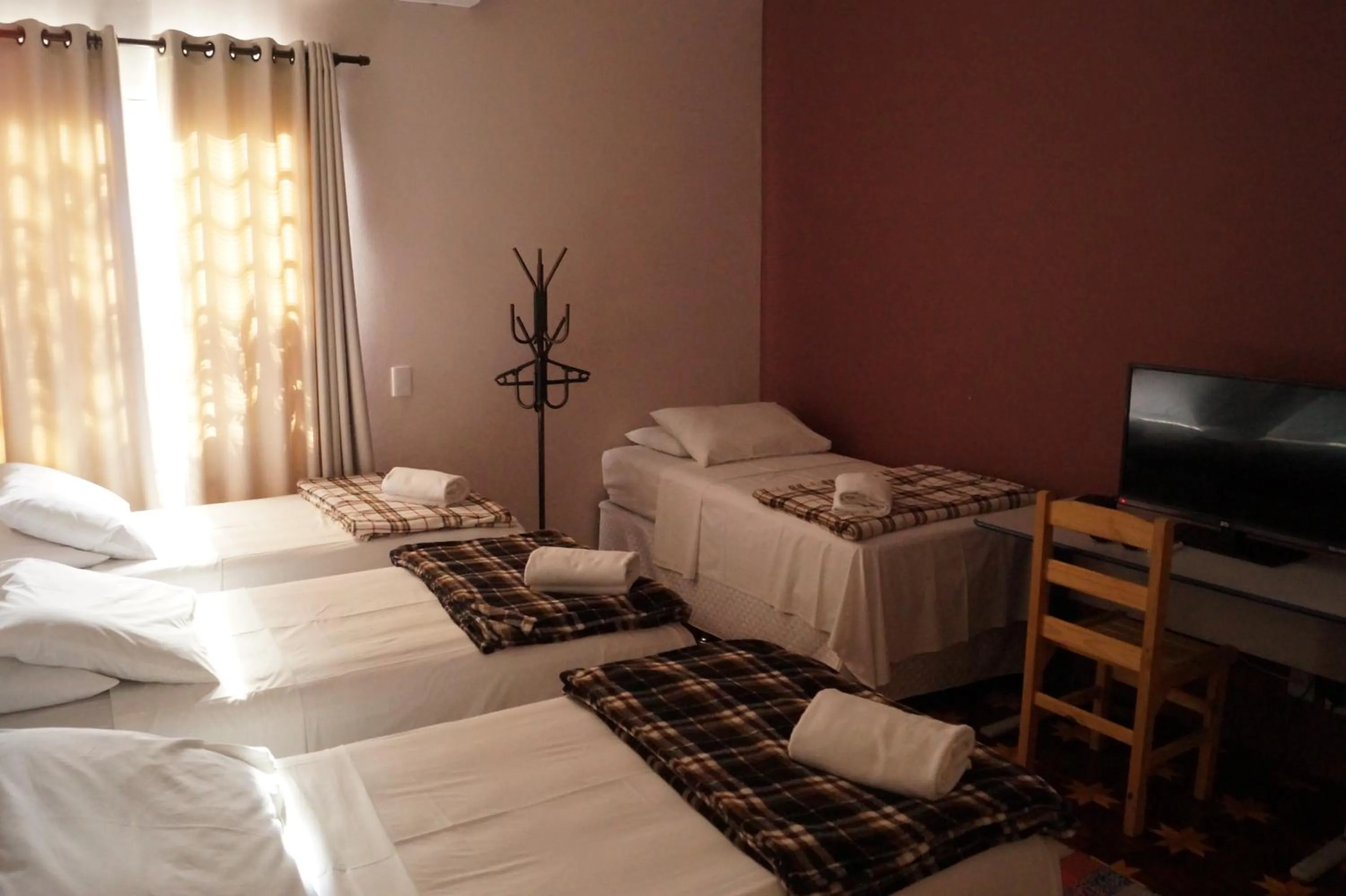 Bed in Ipê Rosa Hotel