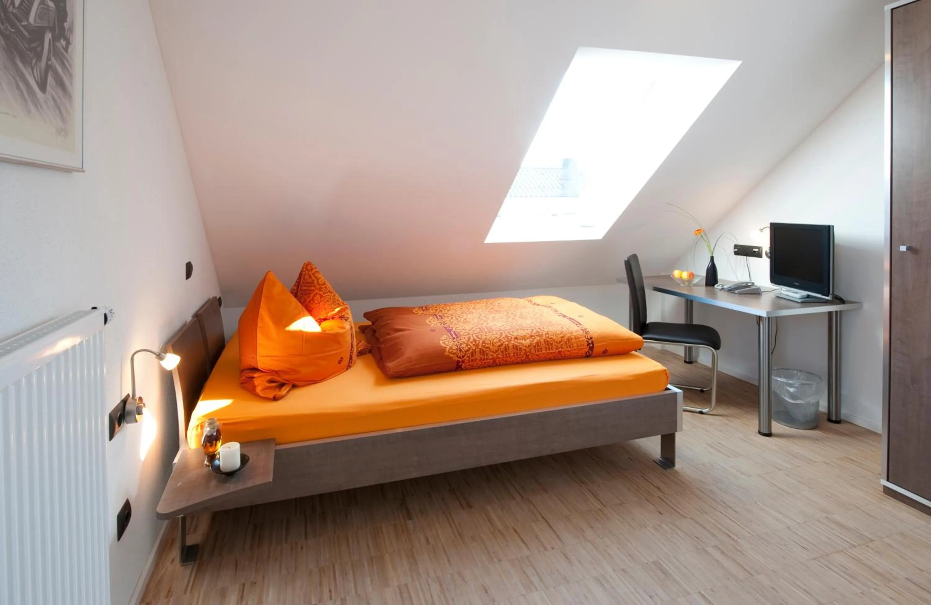 Bed in Hotel Merlin
