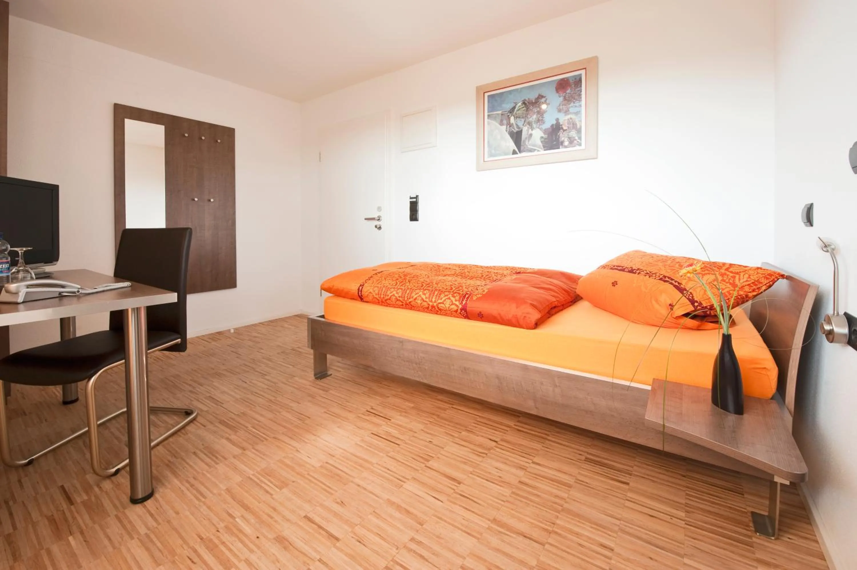 Bed in Hotel Merlin