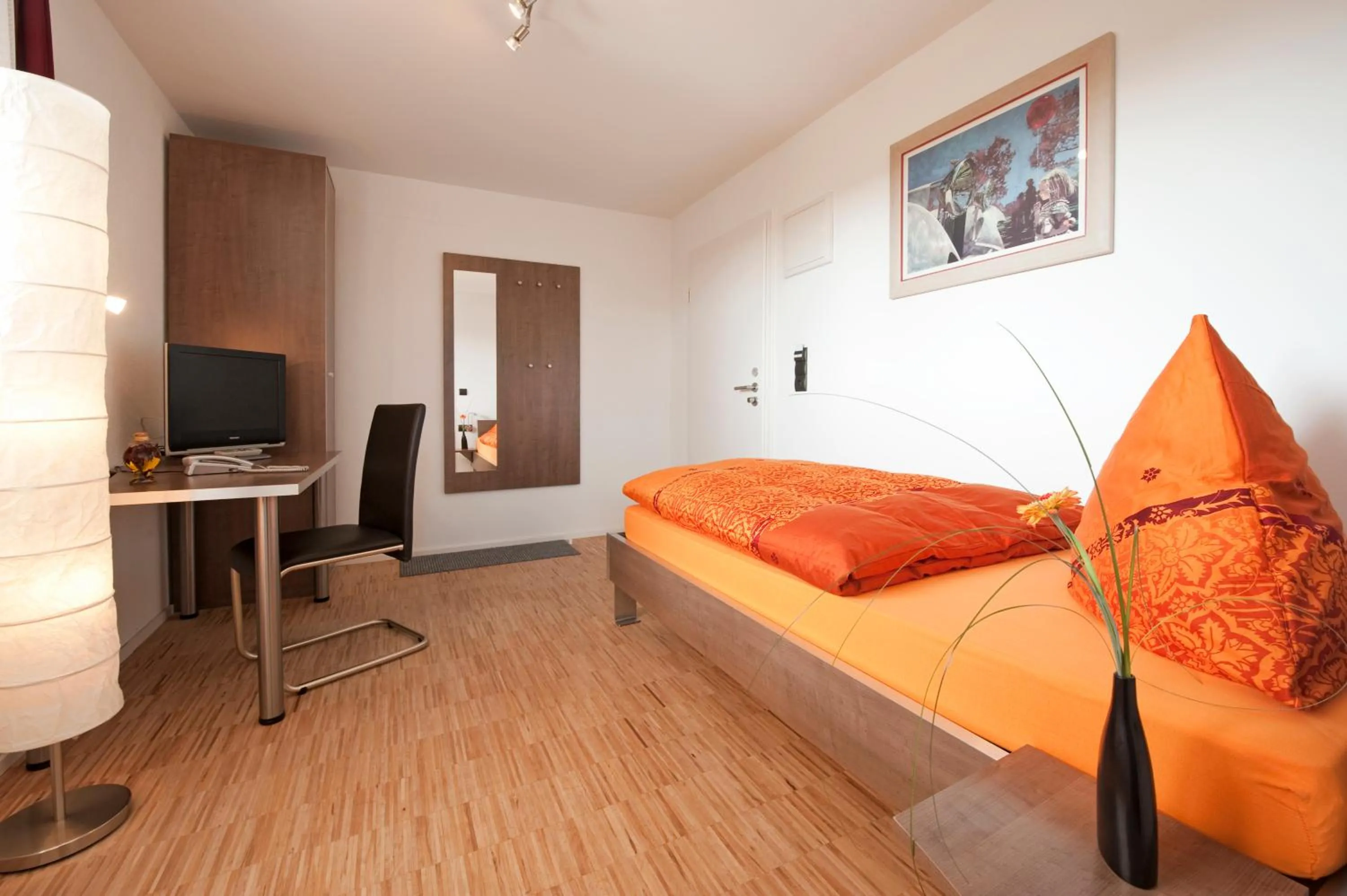 Bed in Hotel Merlin