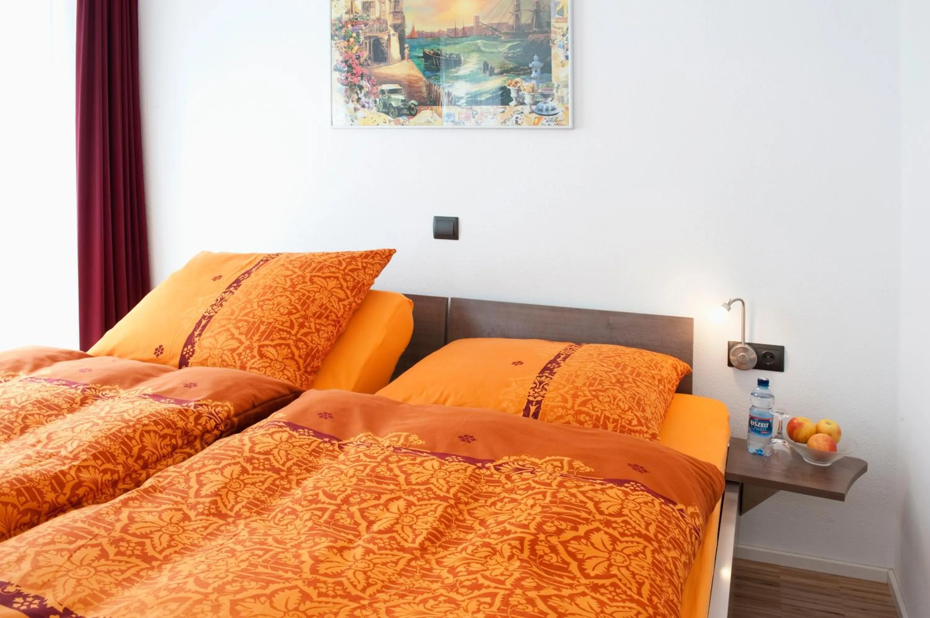 Bed in Hotel Merlin
