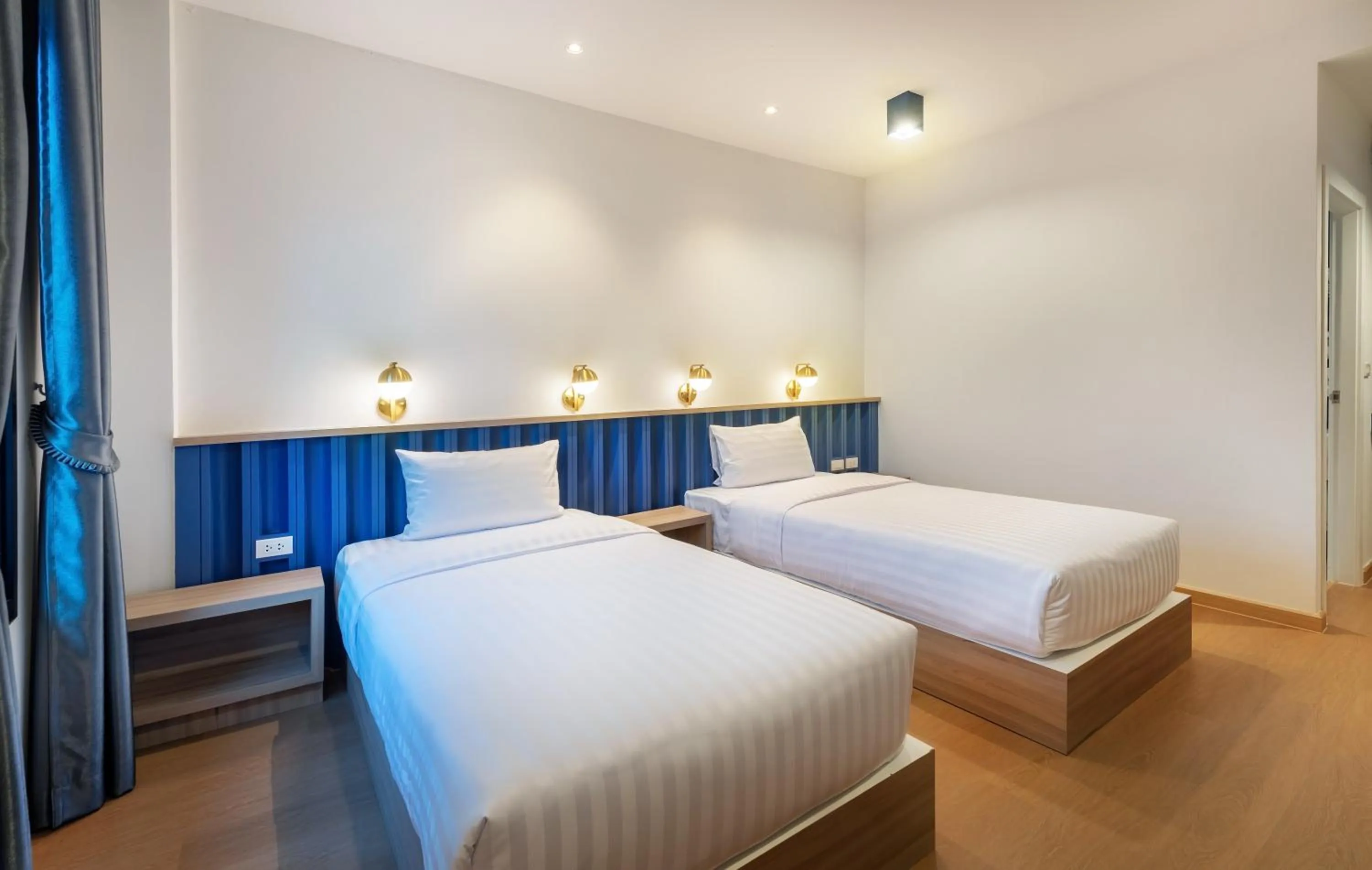 Bed in Nine River Hotel