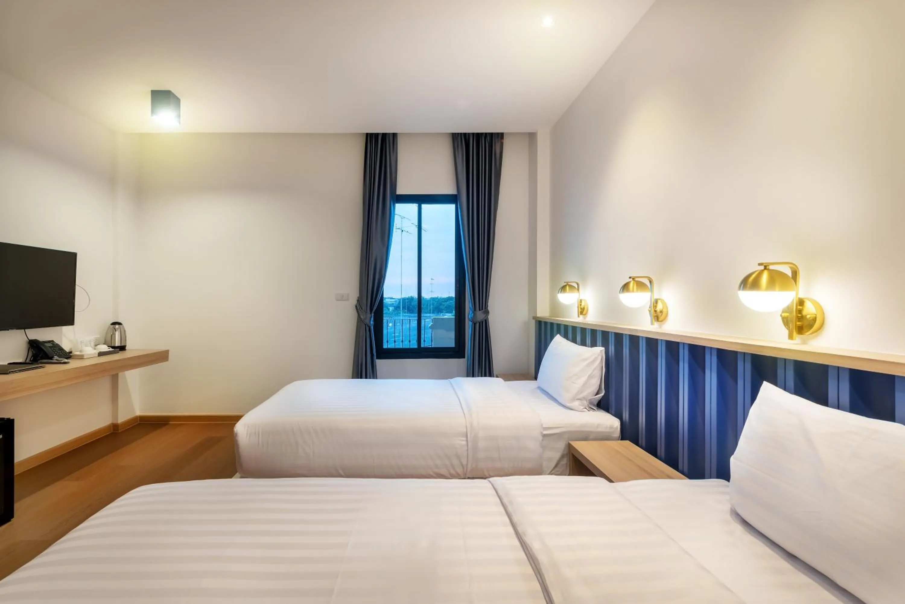 Bed in Nine River Hotel