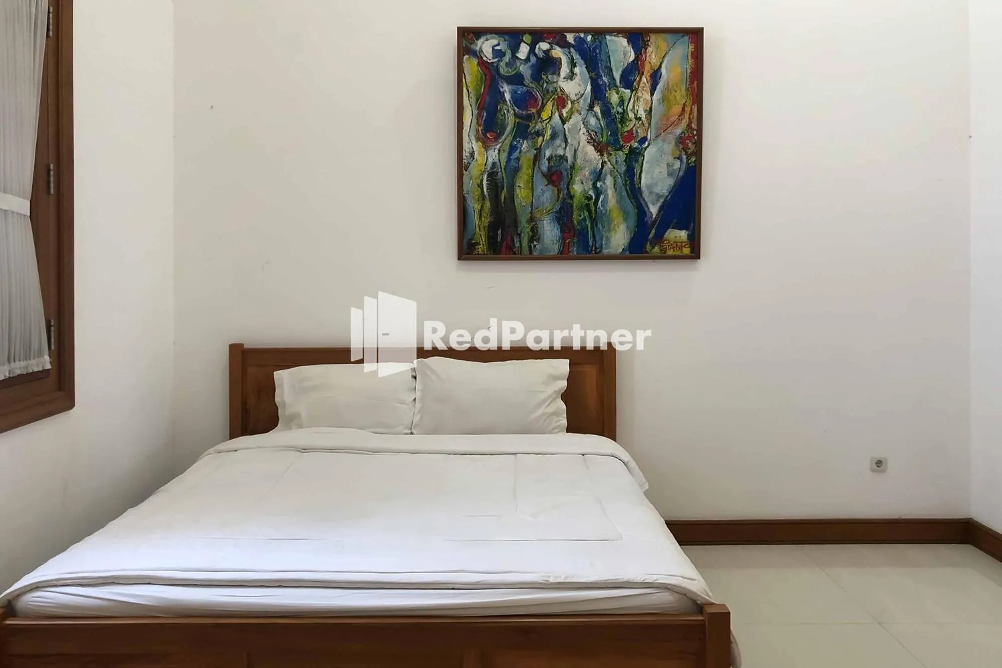 Bed in RedDoorz at Daffi Araya