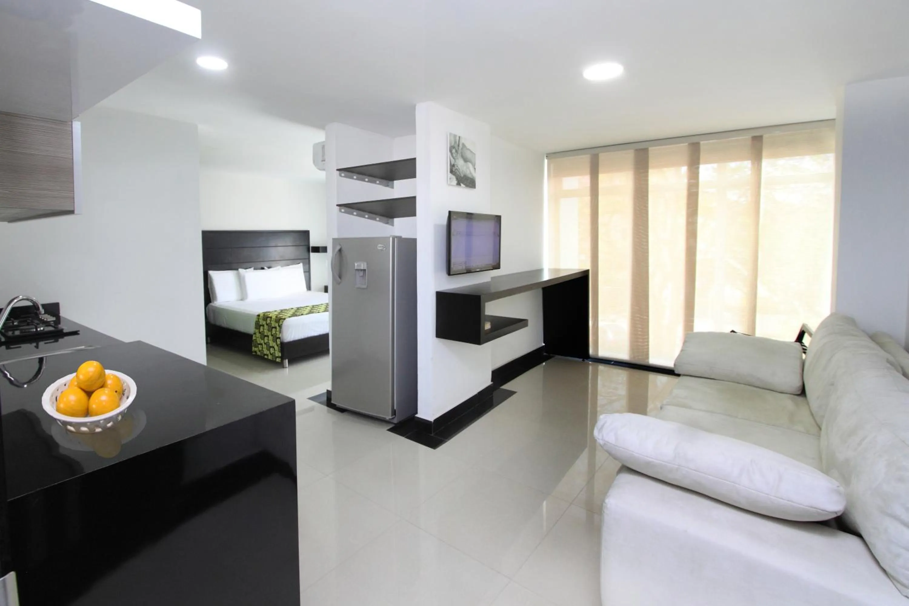 Communal lounge/ TV room in Hotel Genova Prado