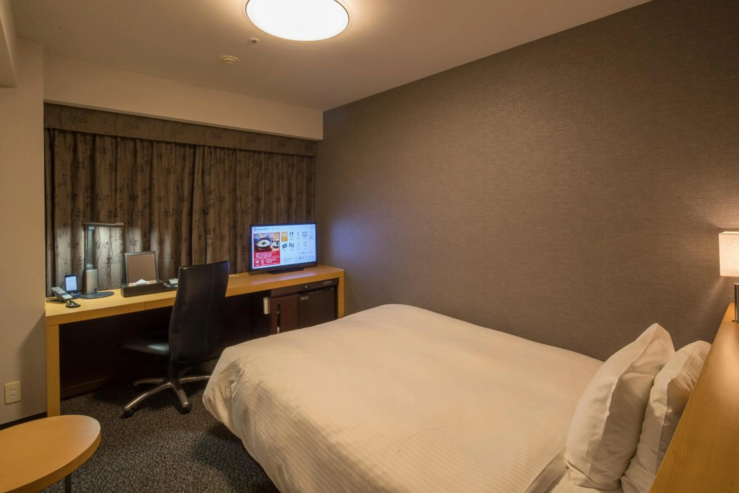 Bed in Richmond Hotel Kumamoto Shinshigai