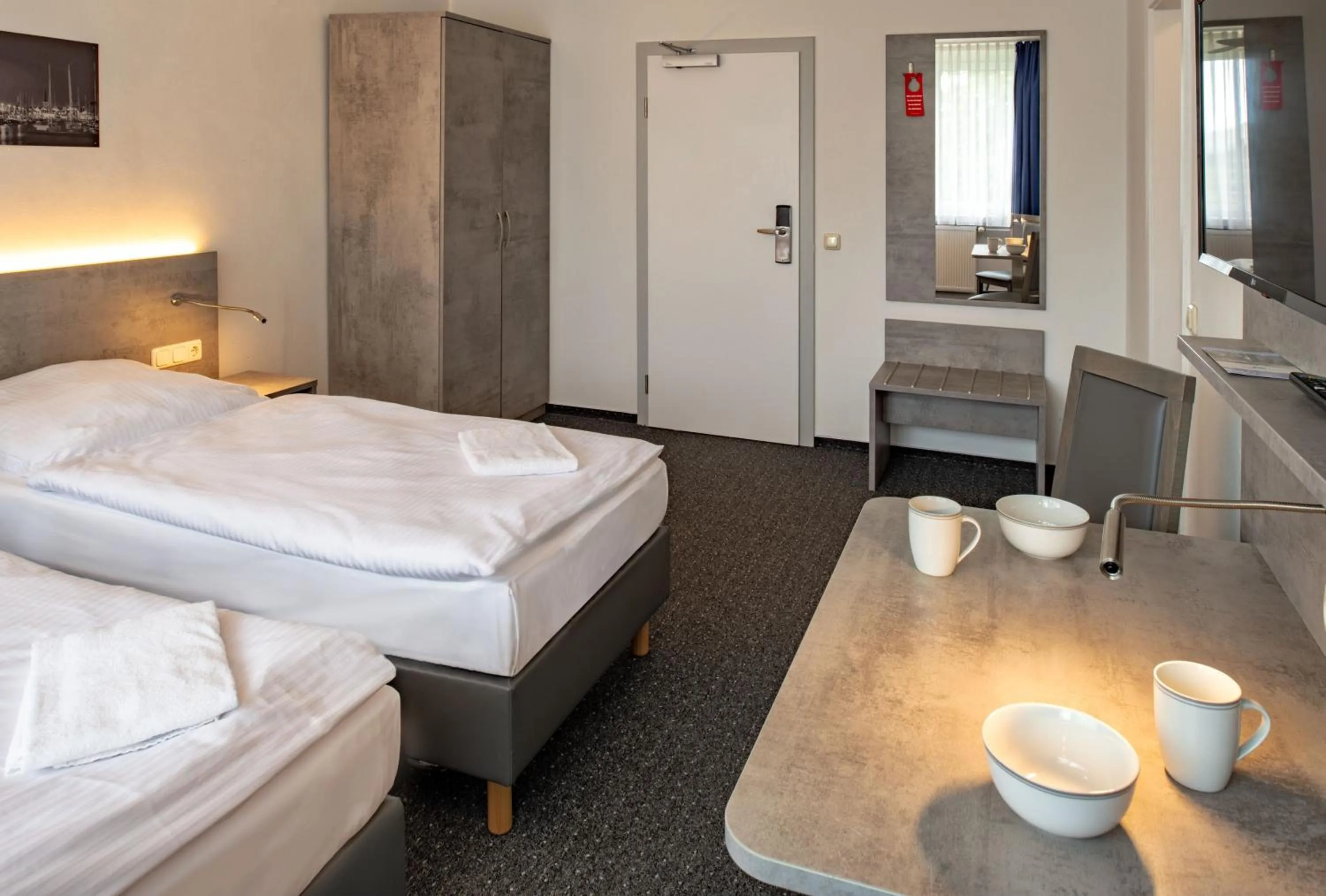 Photo of the whole room, Bed in Hotel & Gästehaus Rostock Lütten Klein