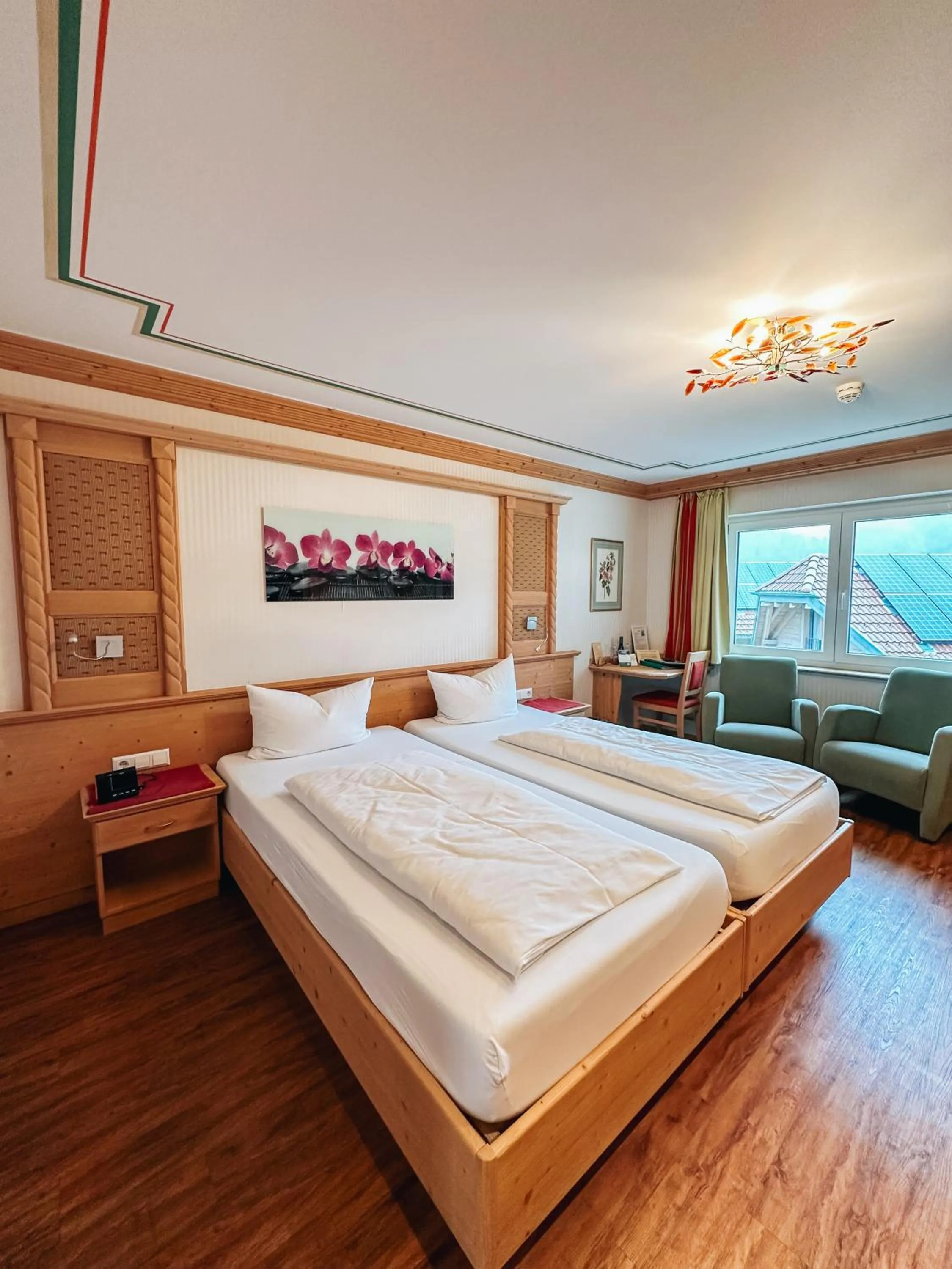 Photo of the whole room, Bed in Hotel Schwarzwald-Resort Rößle