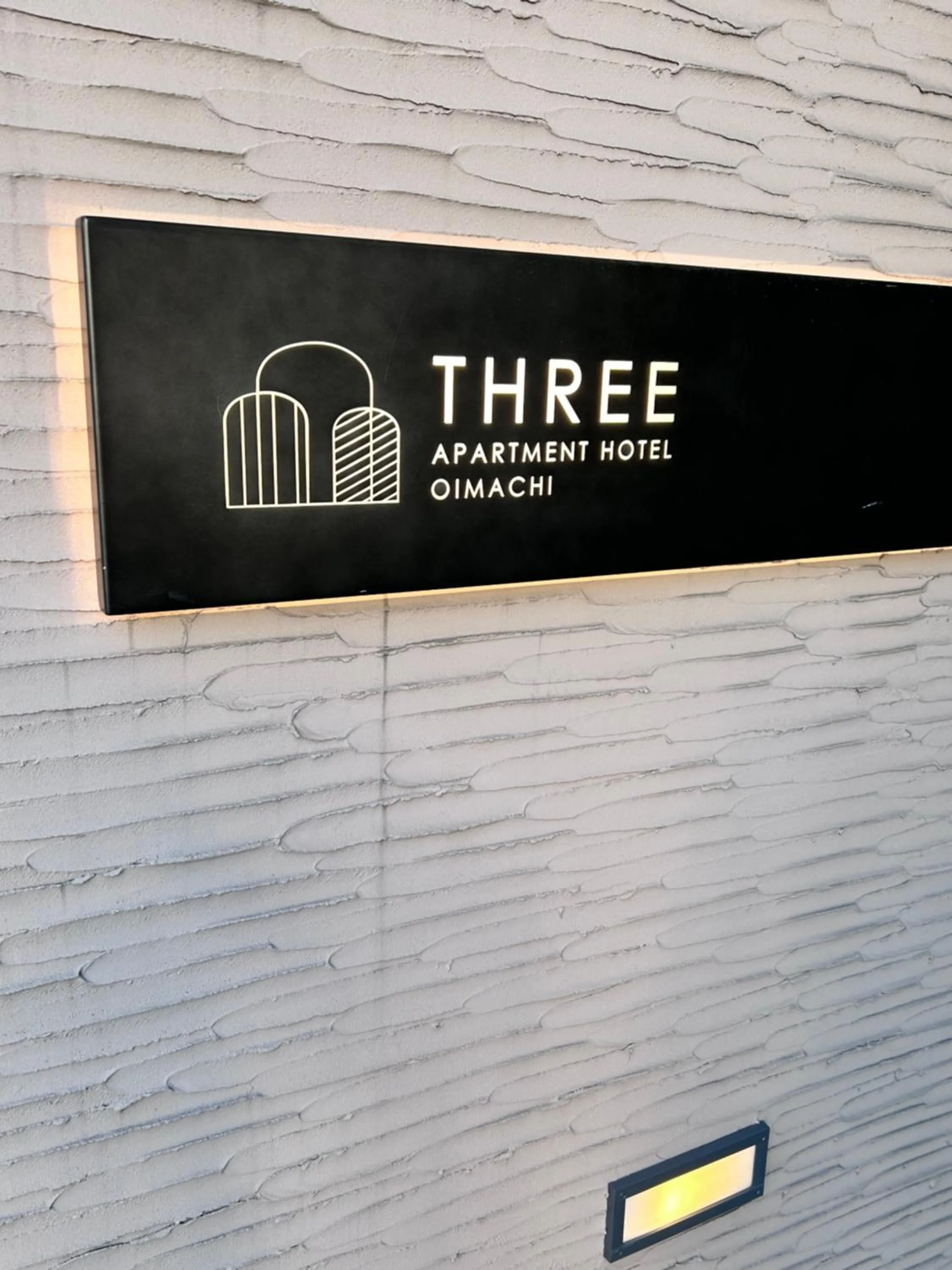 Property logo or sign in THREE