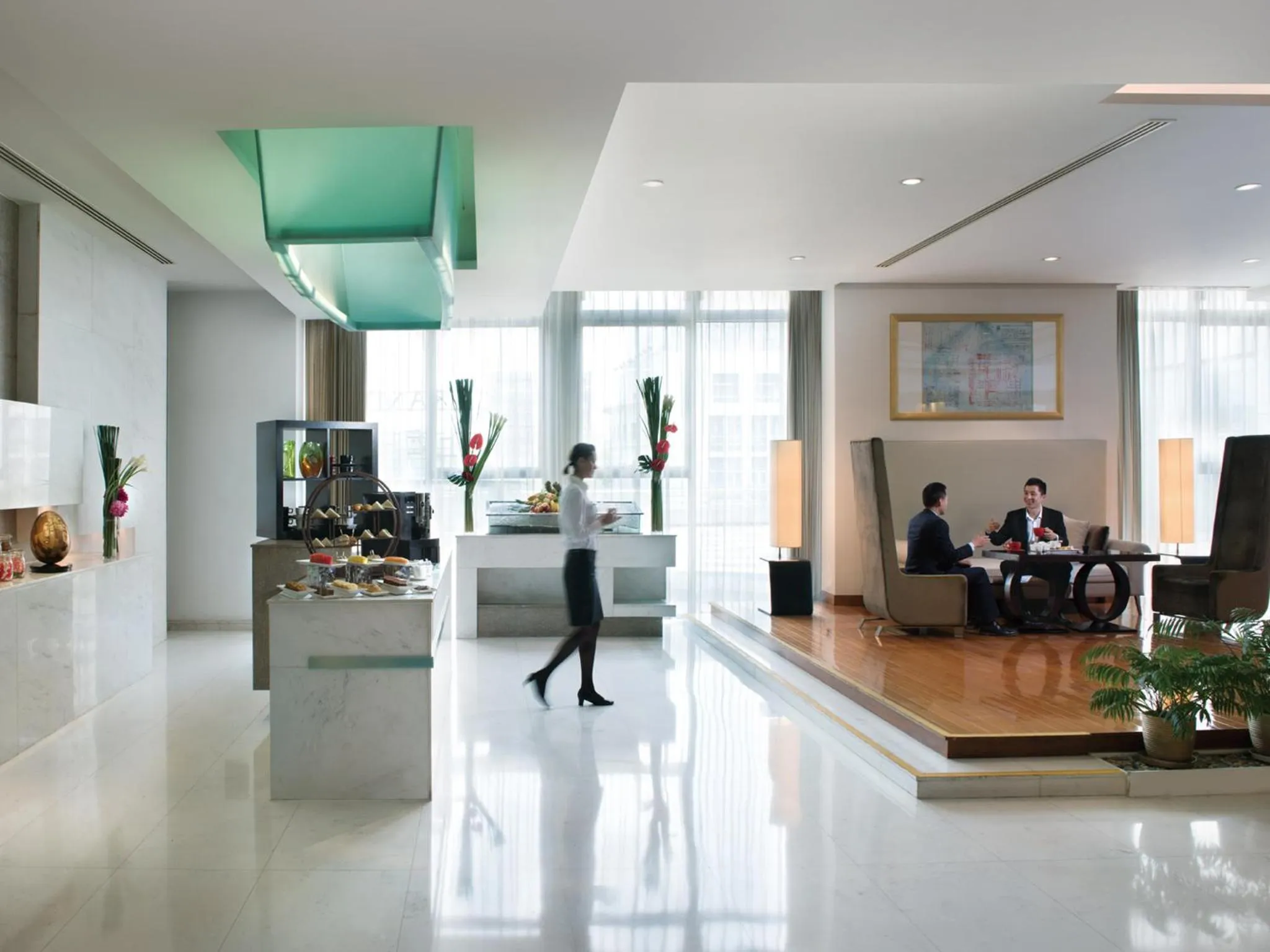 Communal lounge/ TV room in Grand Millennium Shanghai HongQiao