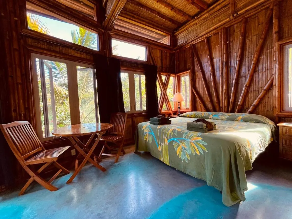 Bed in Kalani Oceanside Retreat