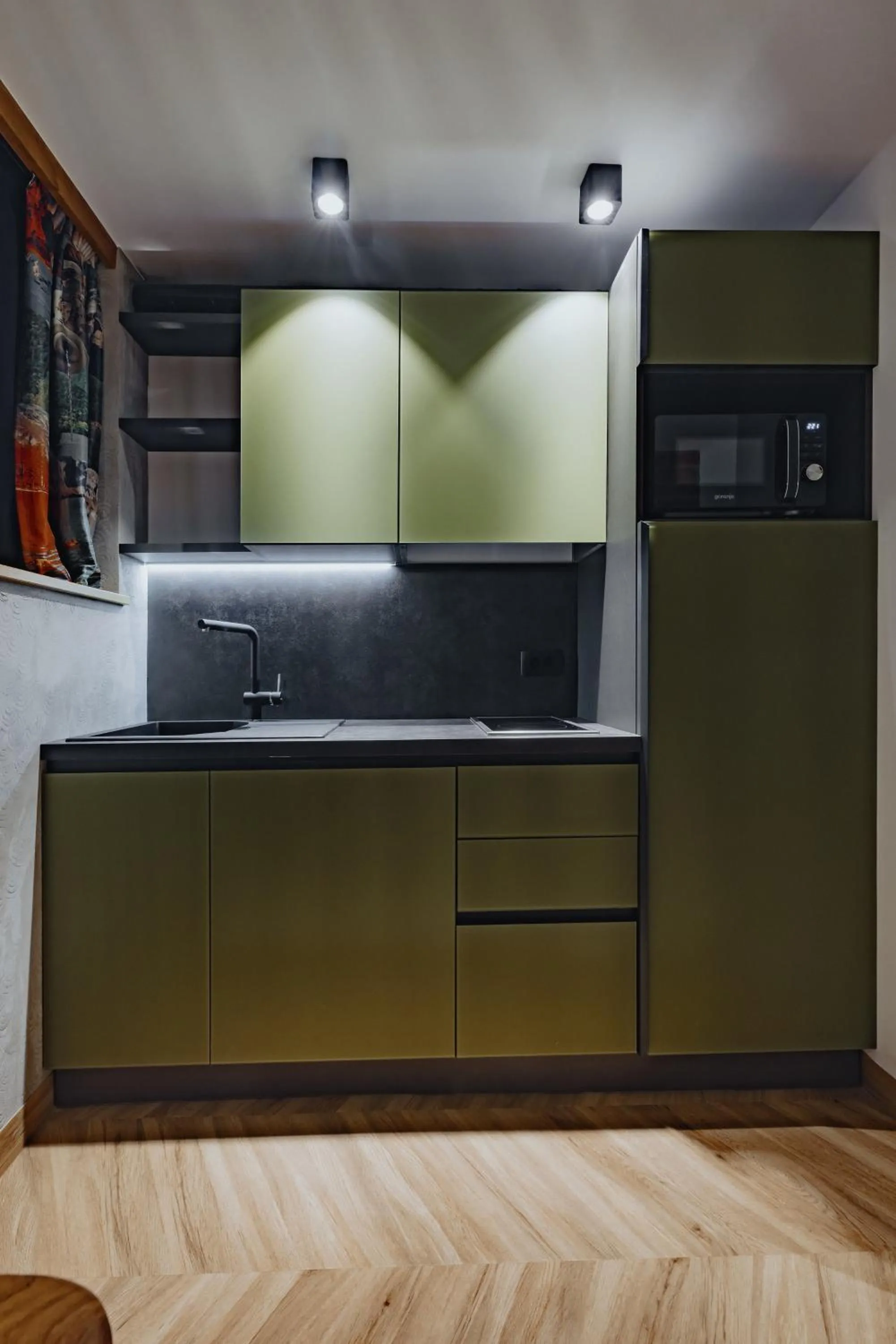 Kitchen or kitchenette in ONE66 Hotel