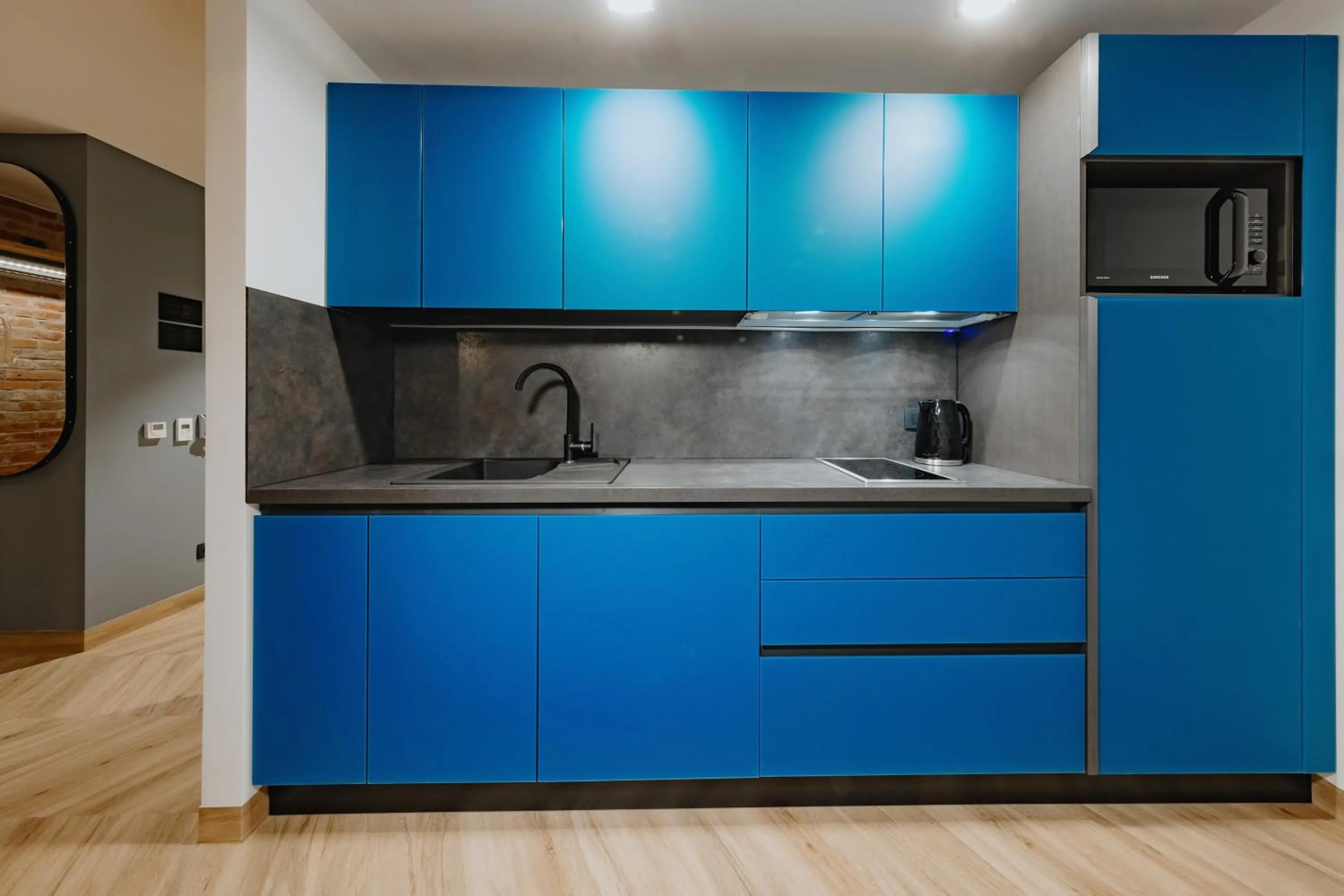 Kitchen or kitchenette in ONE66 Hotel