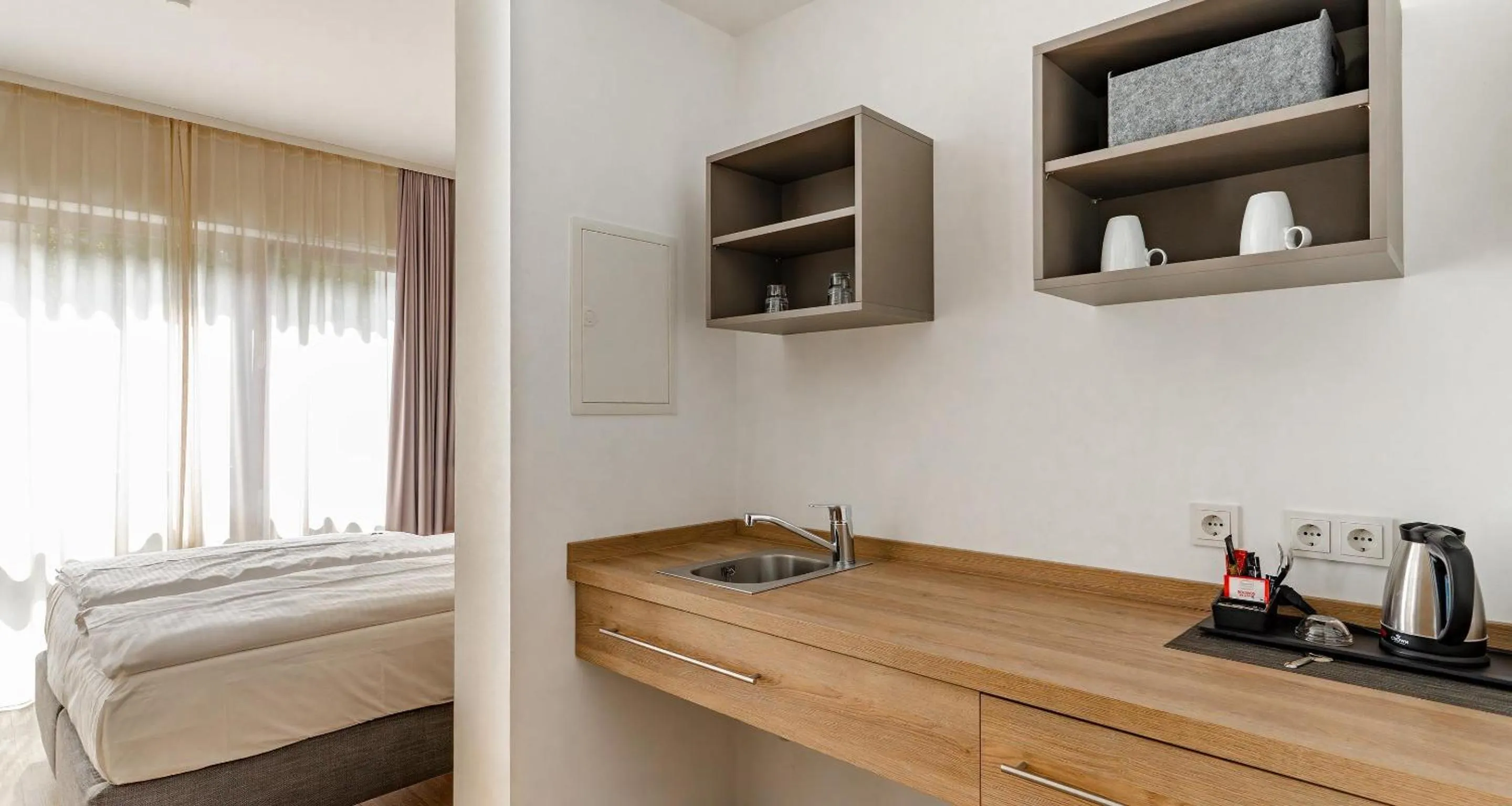 Kitchen or kitchenette, Bed in Best Western Plus Hotel Ostertor