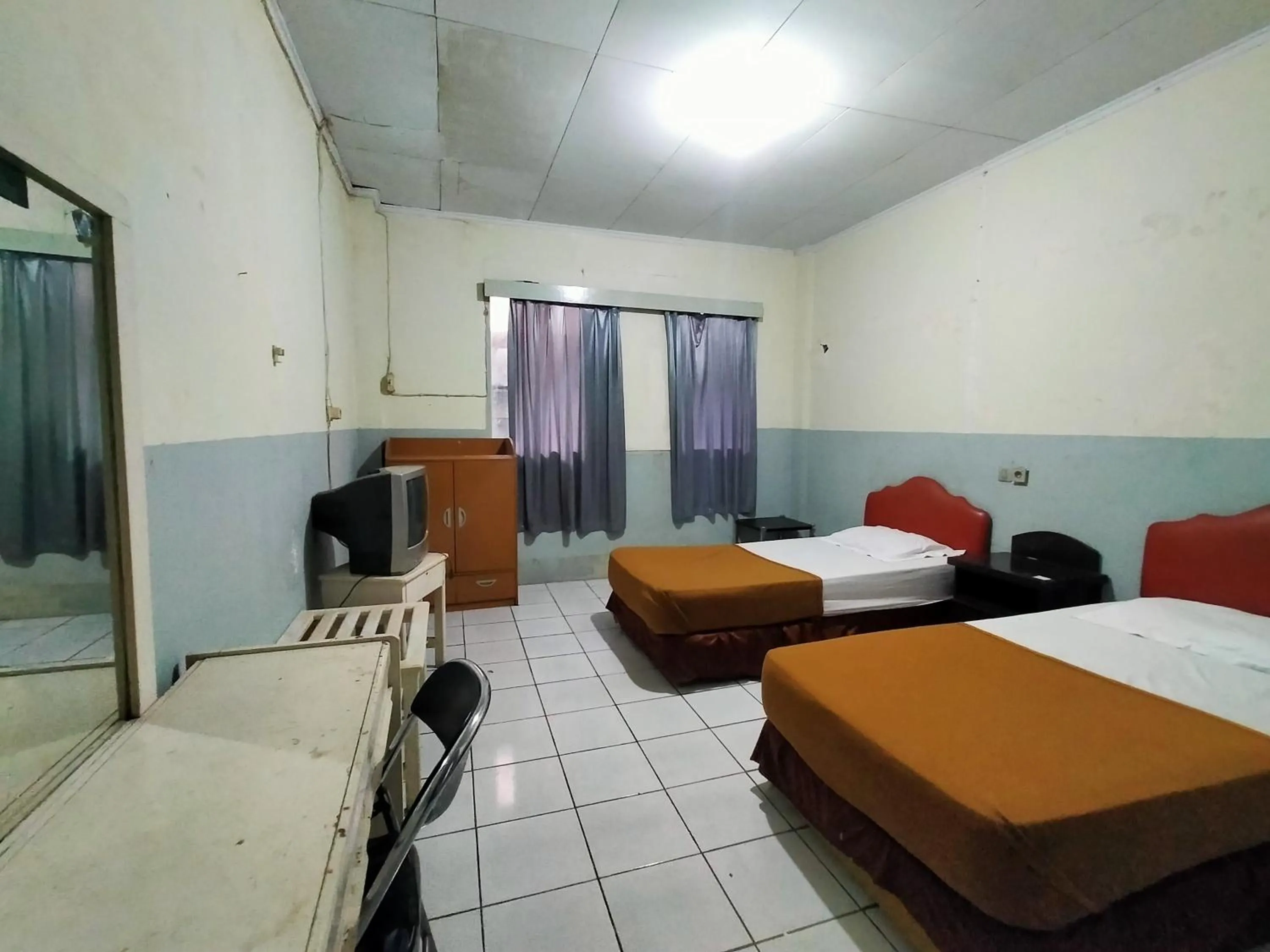 Bedroom, Bed in Hotel Nirwana Ternate RedPartner