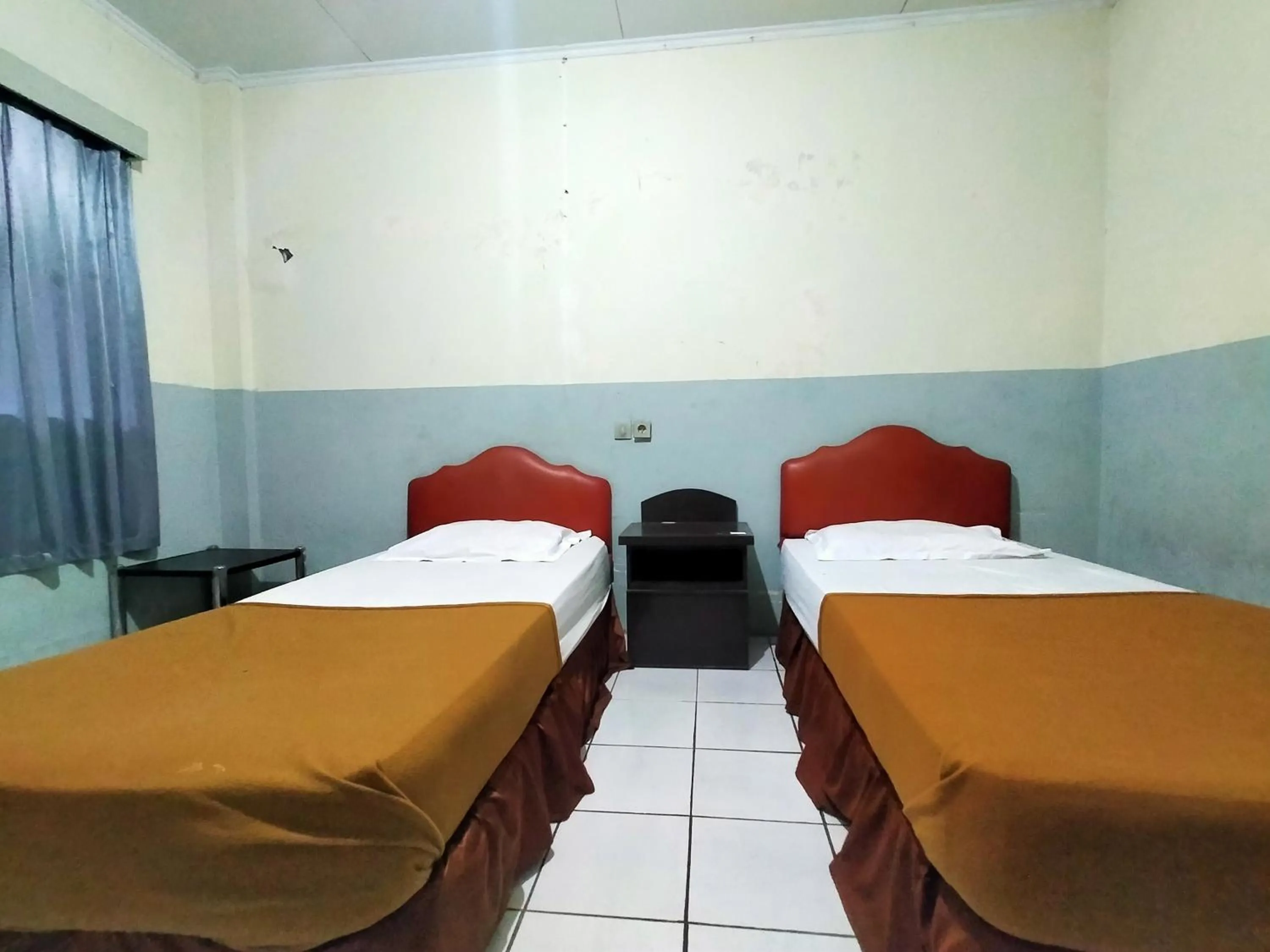 Bedroom, Bed in Hotel Nirwana Ternate RedPartner