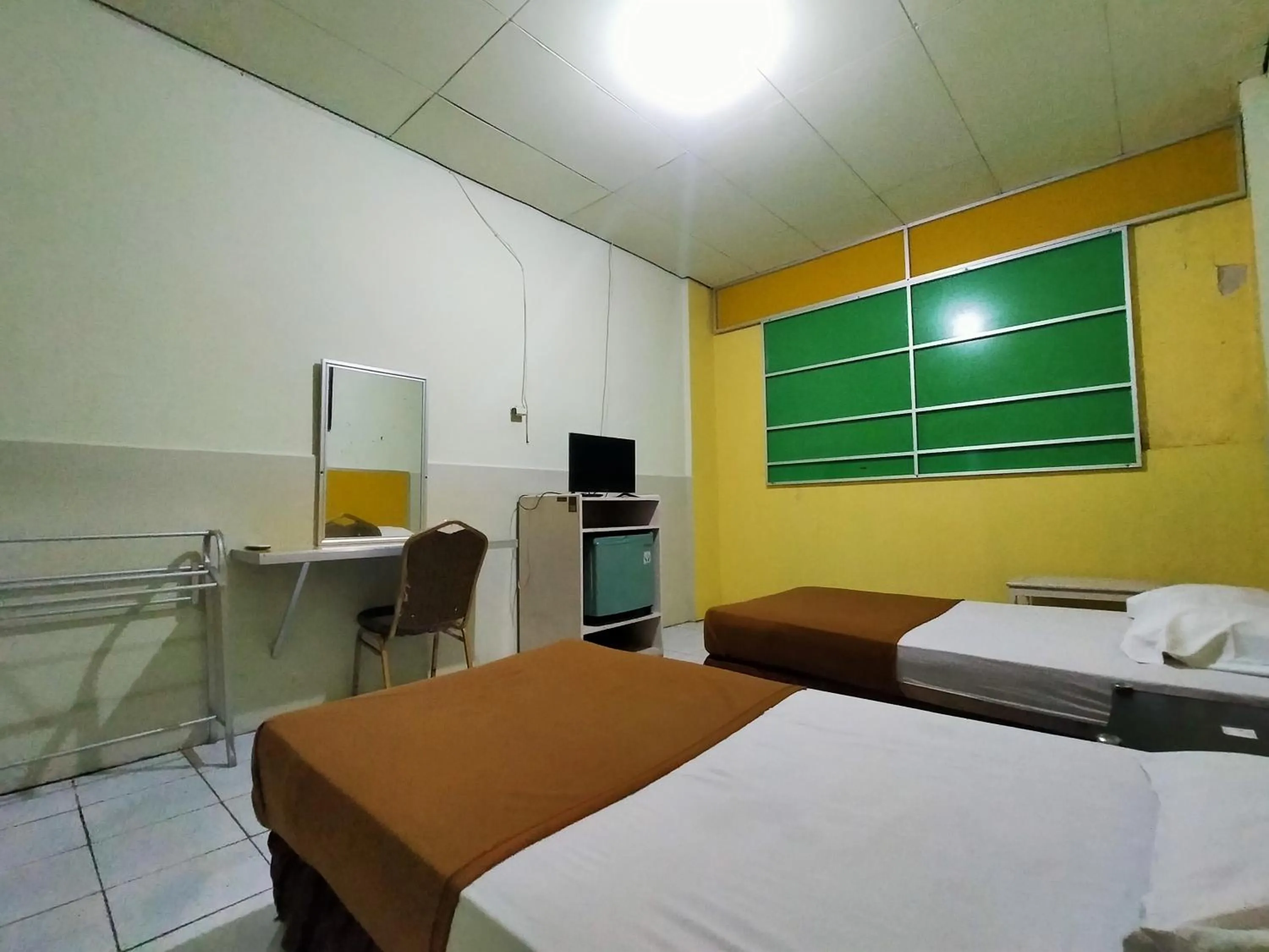 Bedroom, Bed in Hotel Nirwana Ternate RedPartner