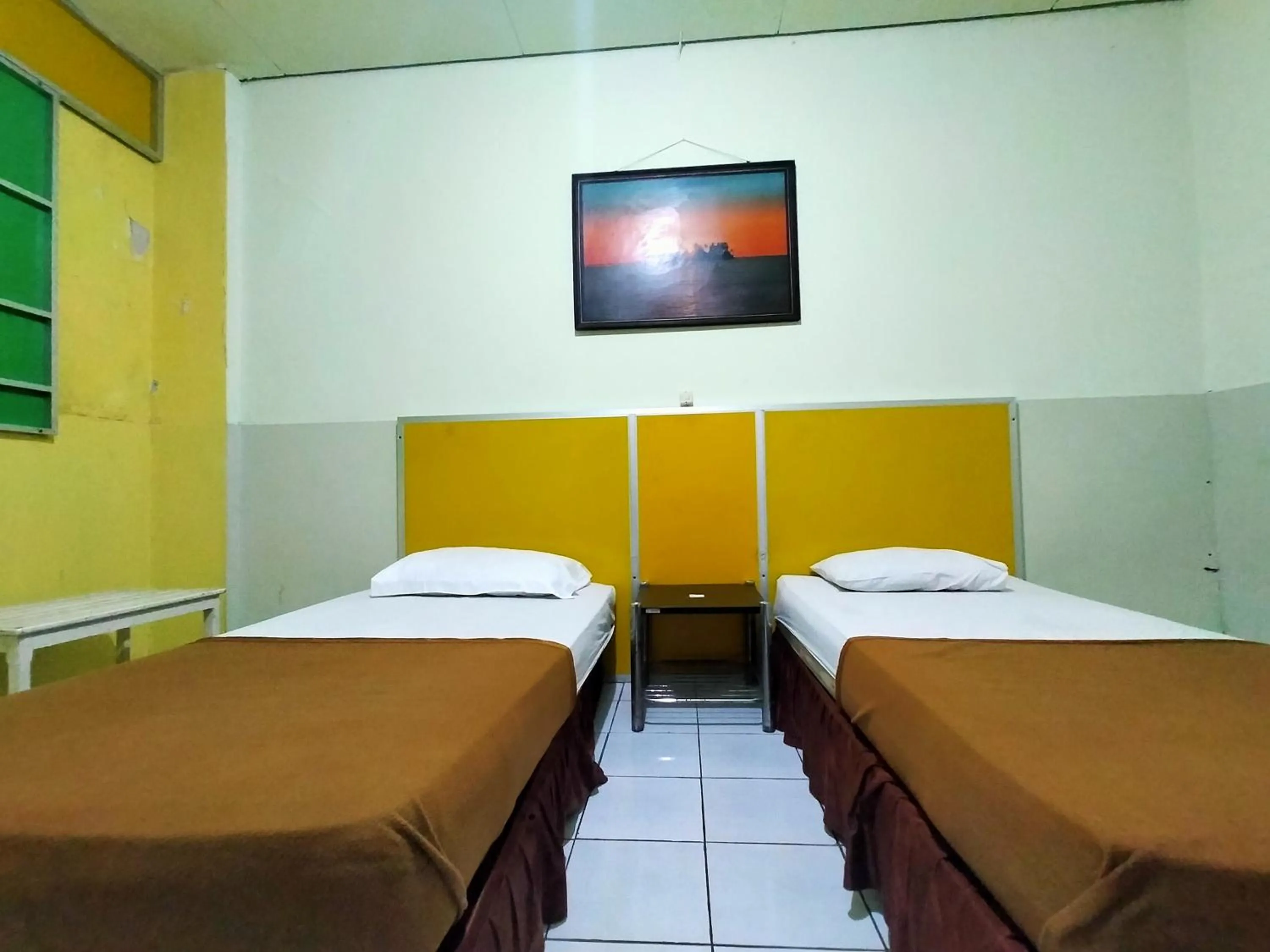 Bedroom, Bed in Hotel Nirwana Ternate RedPartner
