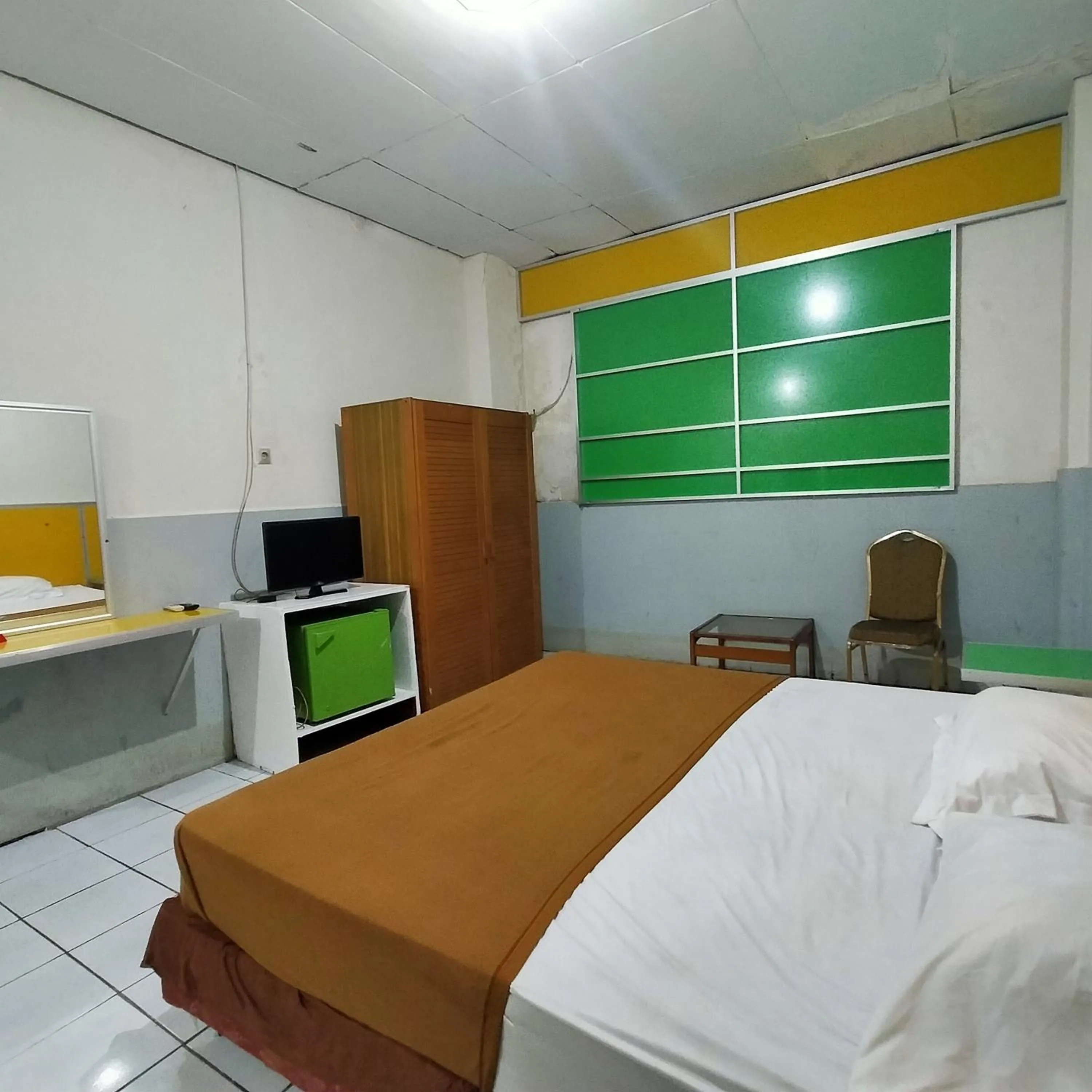 Bedroom, Bed in Hotel Nirwana Ternate RedPartner